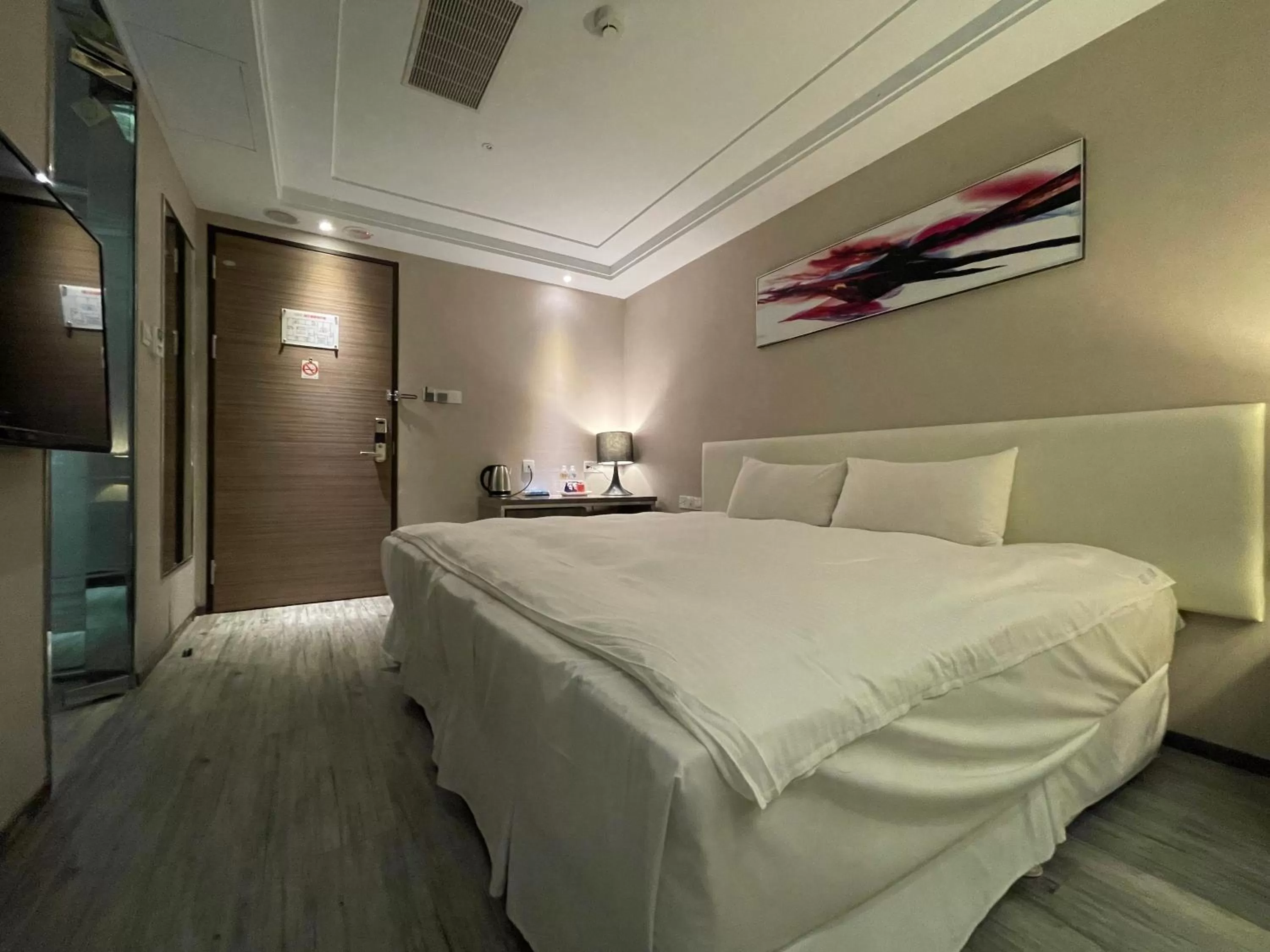 Bed in Royal Fine Hotel