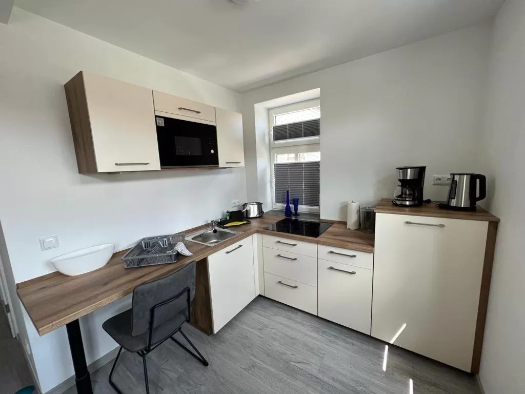 Kitchen or kitchenette in Gasthaus Zur Weintraube