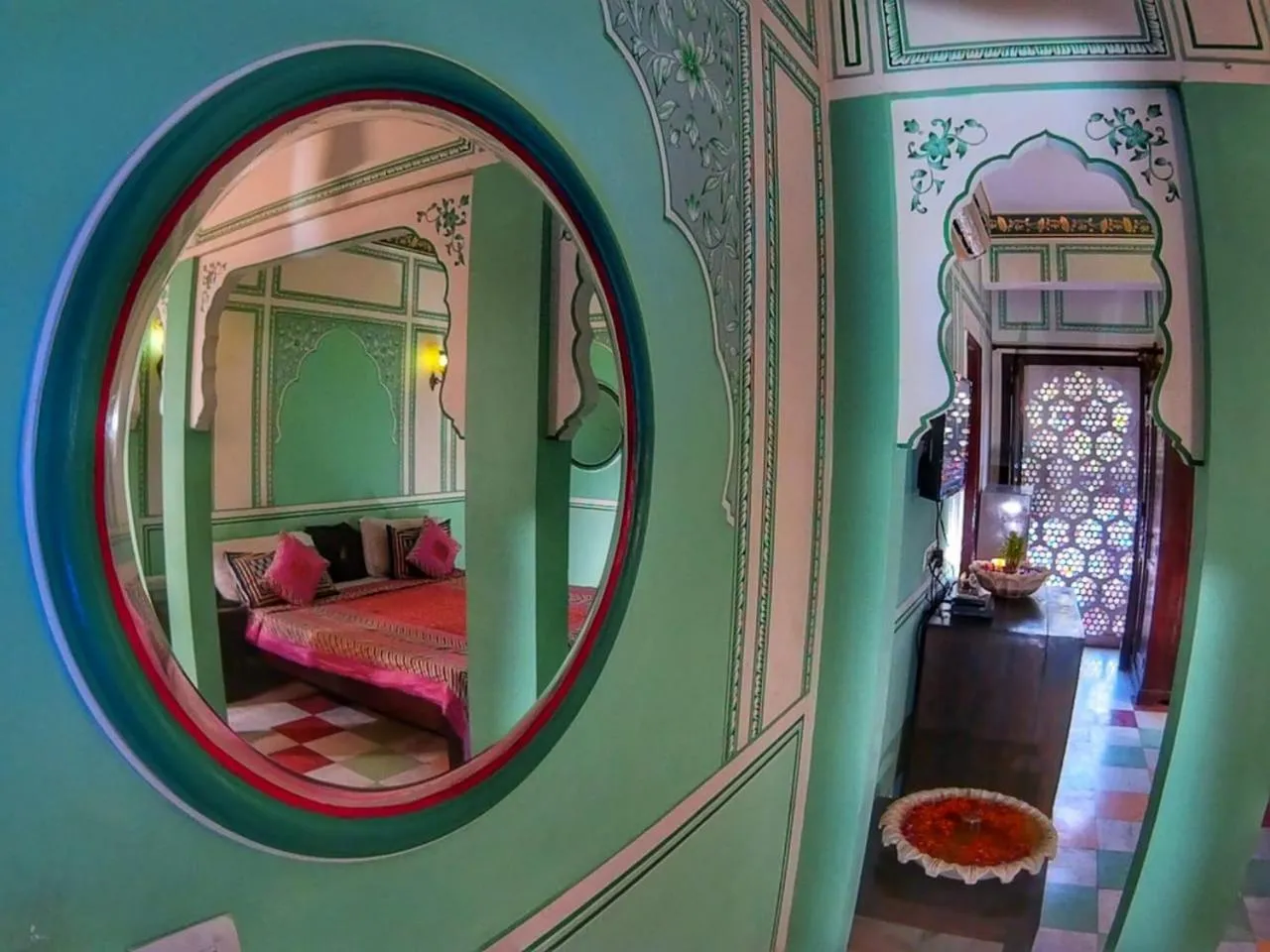 Bed in Rani Mahal Hotel