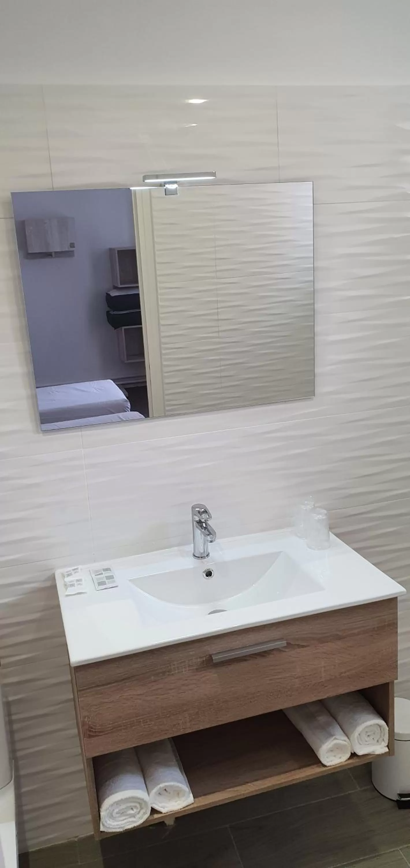 Bathroom in Hôtel L'Alsace