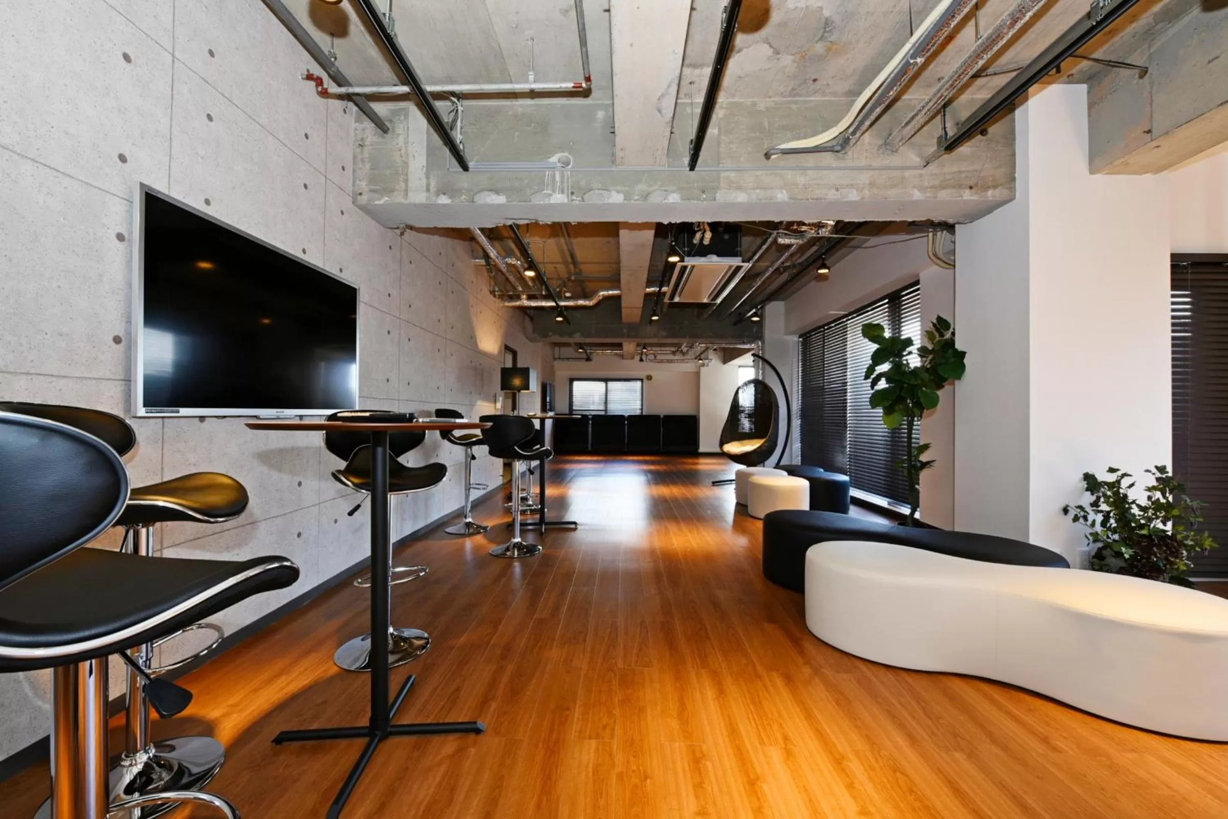 Living room in Hostel PLEASURE MARUYAMA