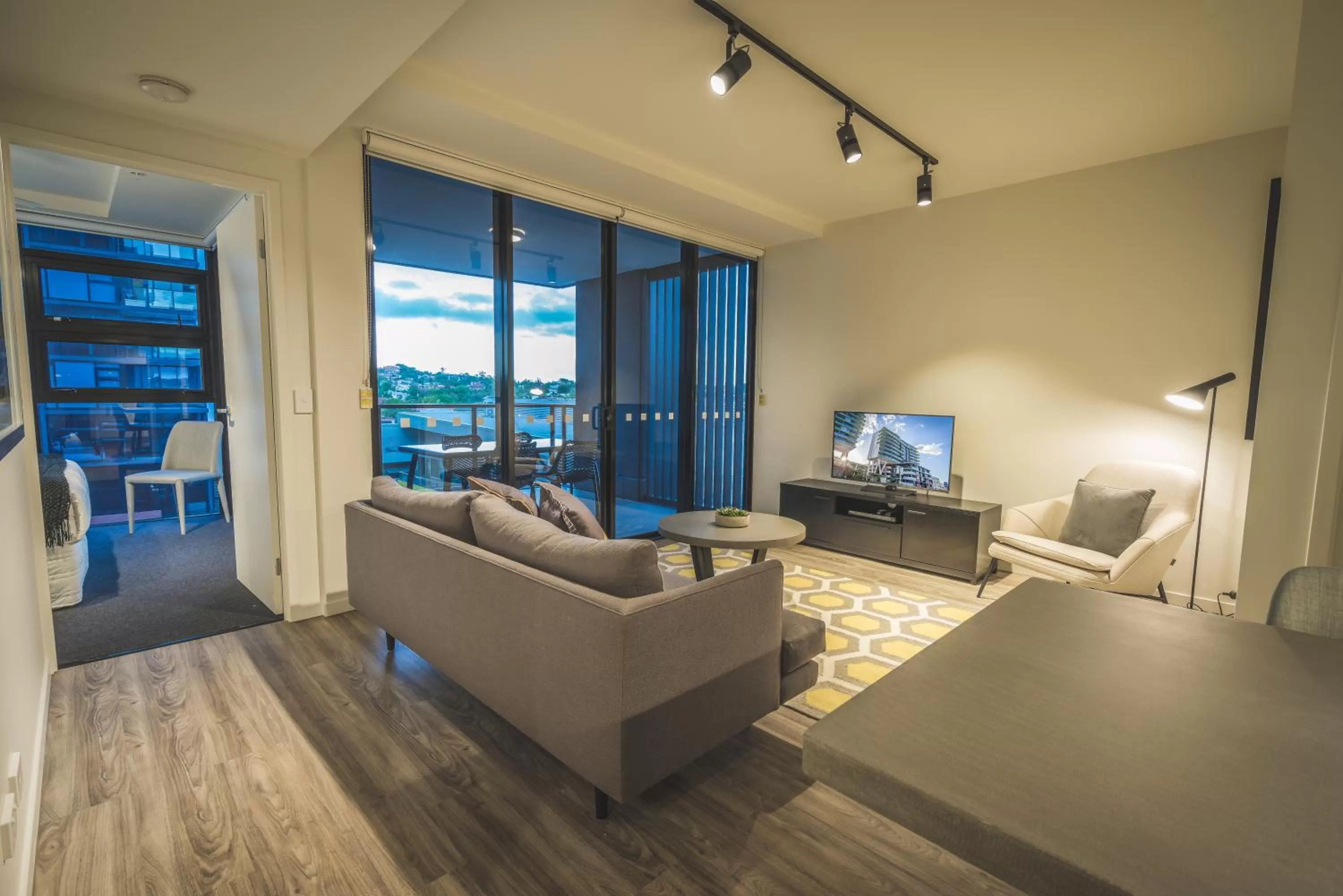 TV and multimedia in Arena Apartments by CLLIX