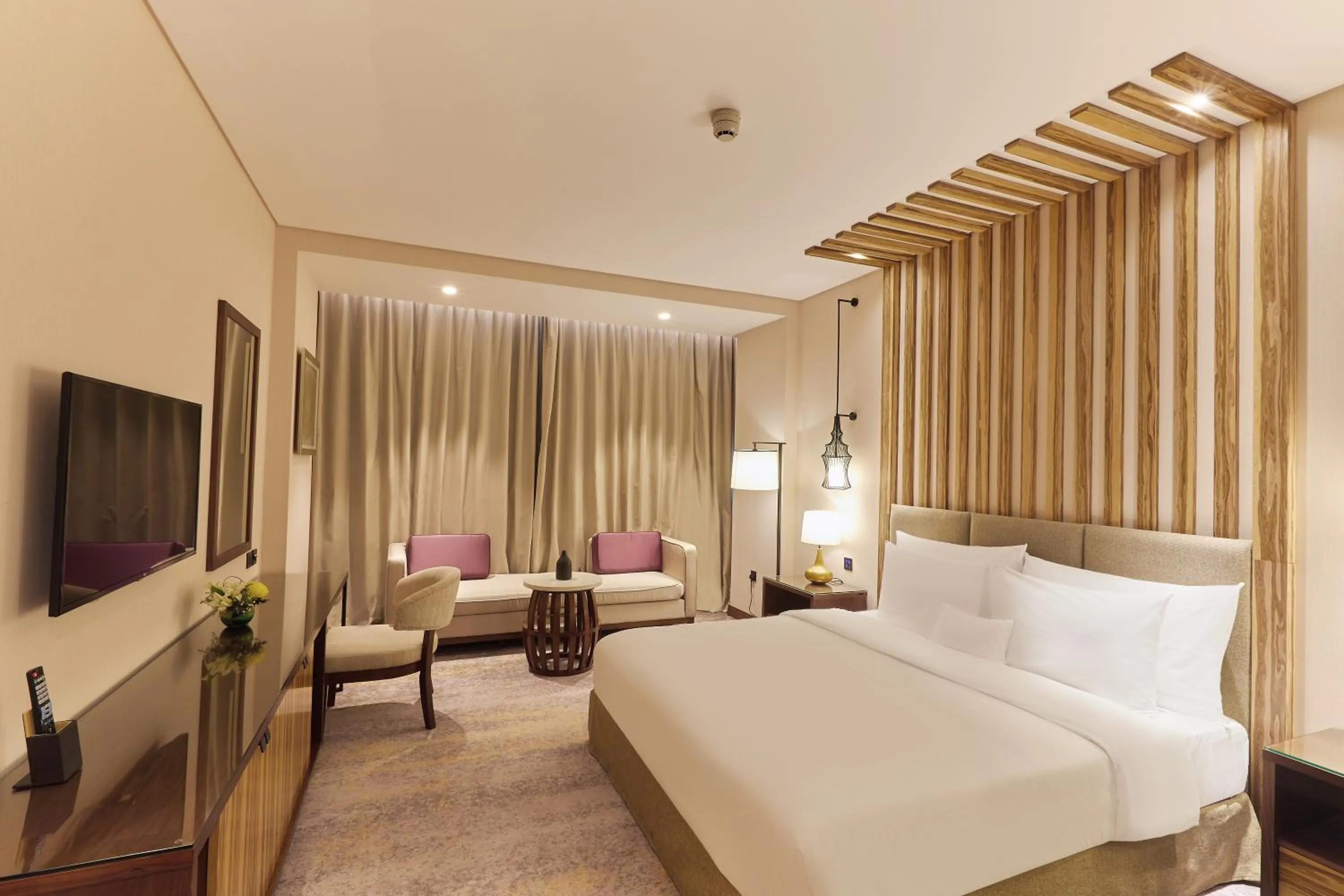 Bedroom, Bed in Millennium Resort Salalah