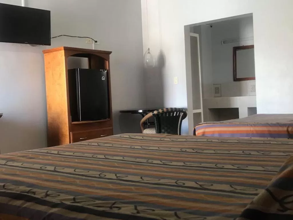 Property building, Bed in Hotel del Camino