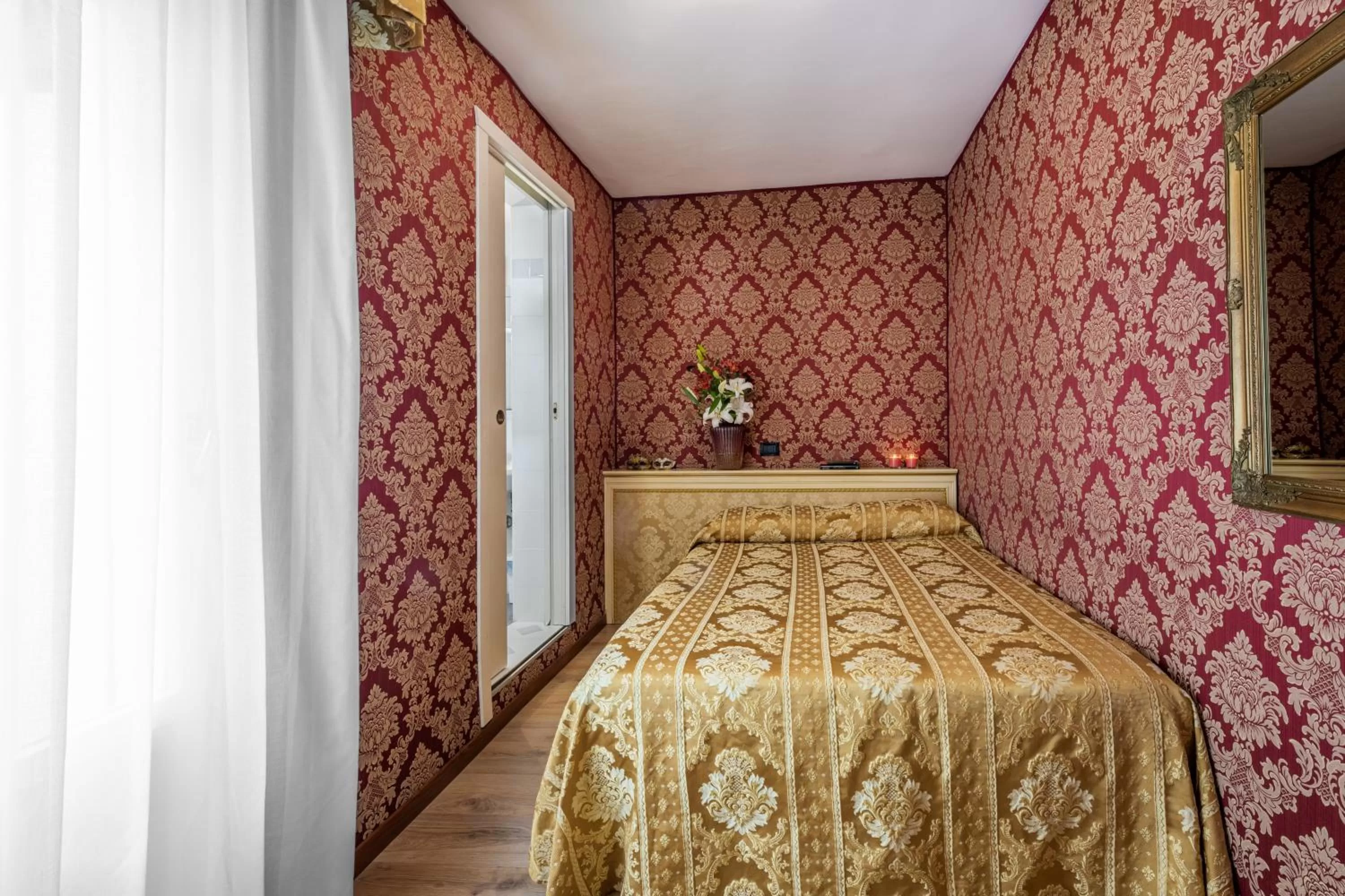 Bed in Hotel Apostoli Garden