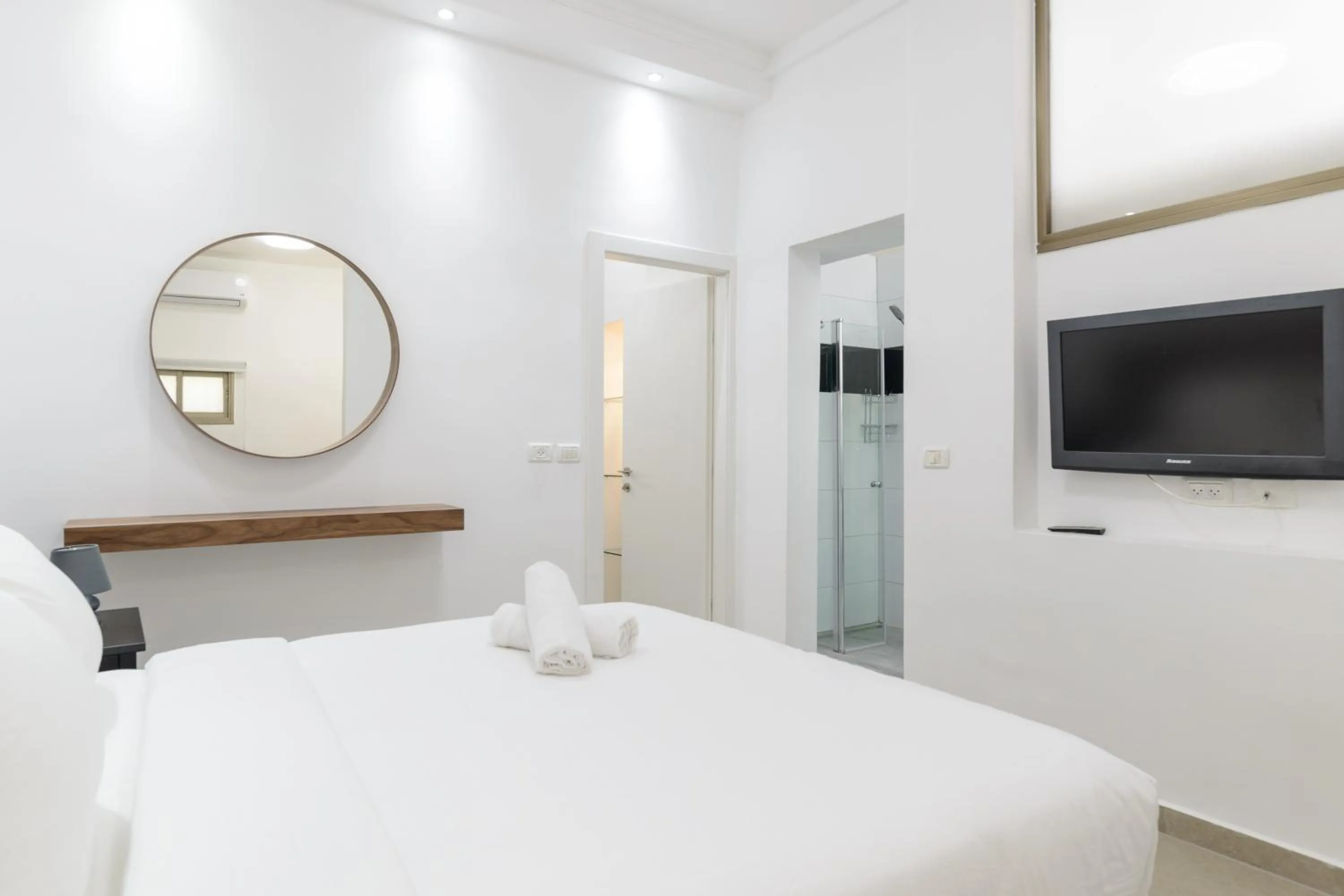 Photo of the whole room, Bed in Liber Tel Aviv Sea Shore Suites BY RAPHAEL HOTELS