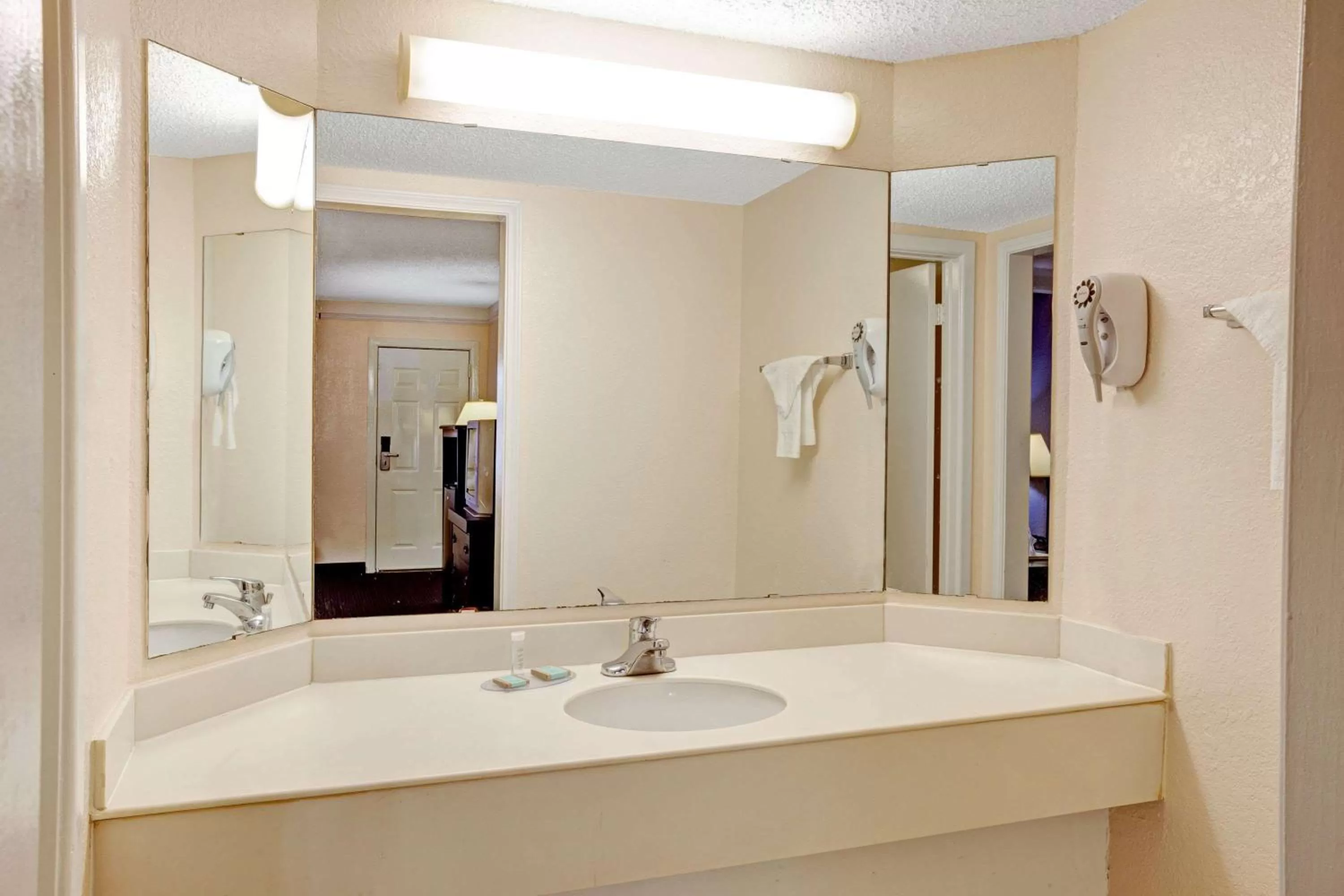 Bathroom in Travelodge by Wyndham North Richland Hills/Dallas/Ft Worth