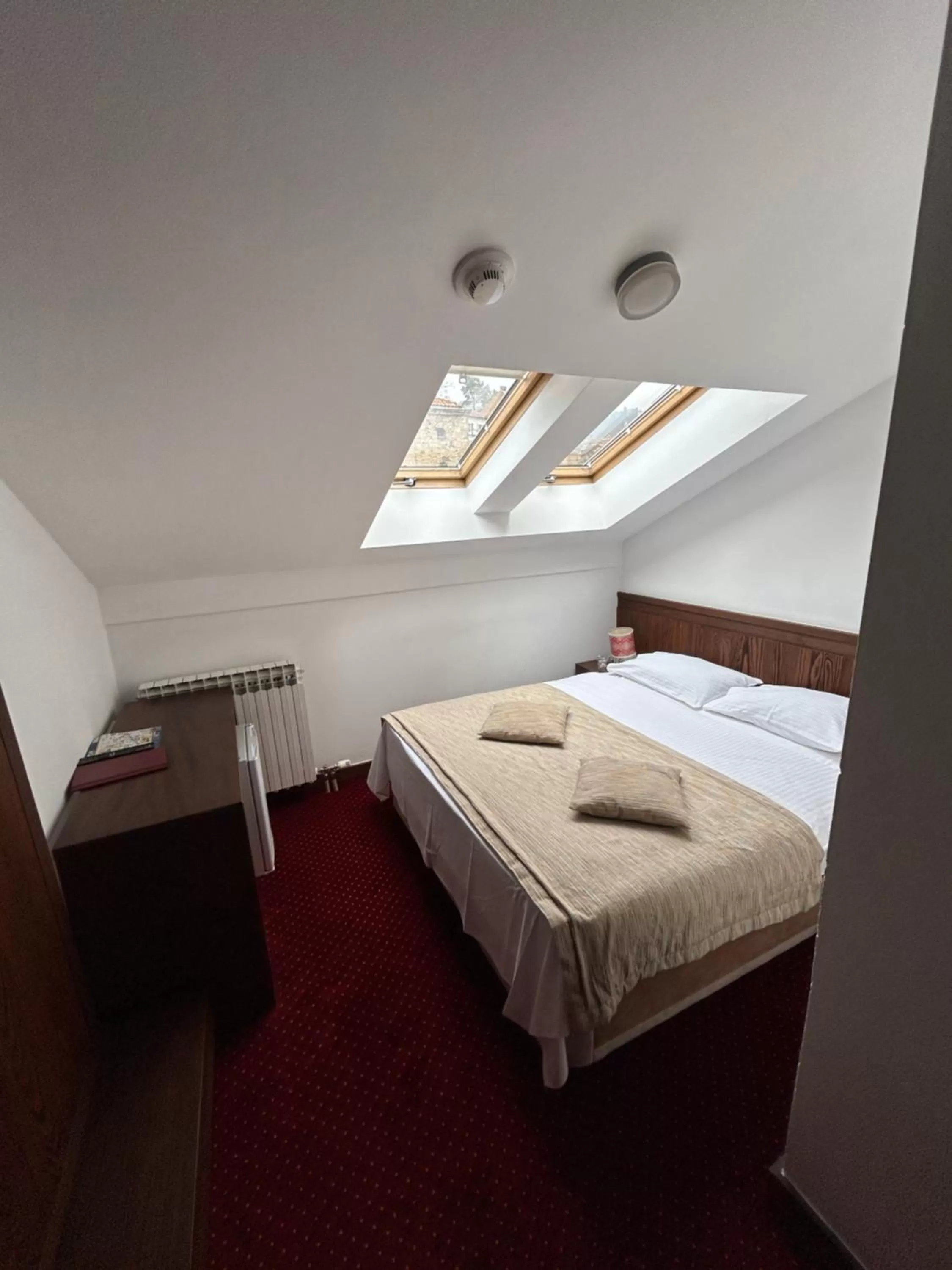 Bed in Garni Hotel Konak