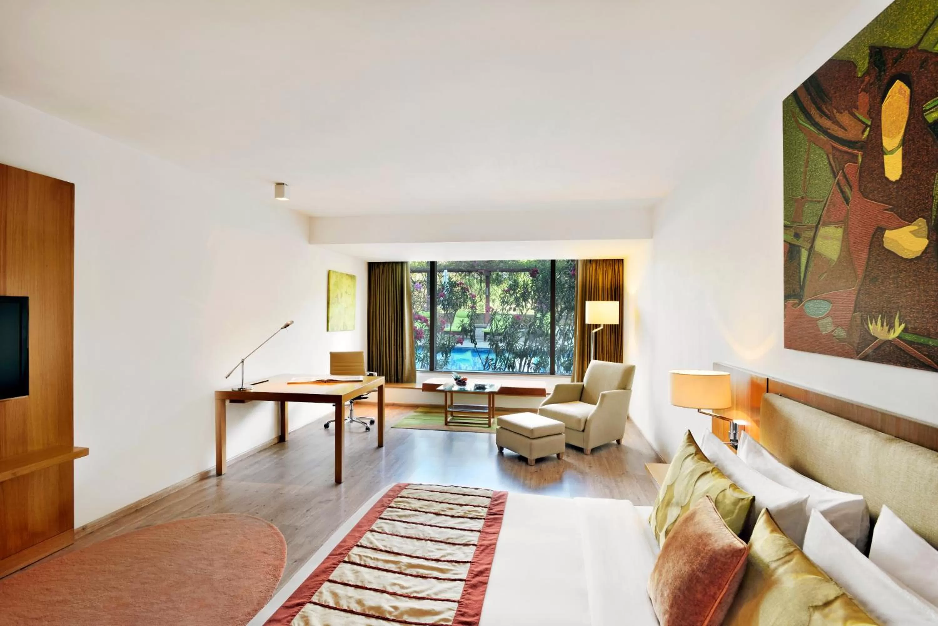 Pool view, Bed in Radisson Blu Plaza Hotel Hyderabad Banjara Hills