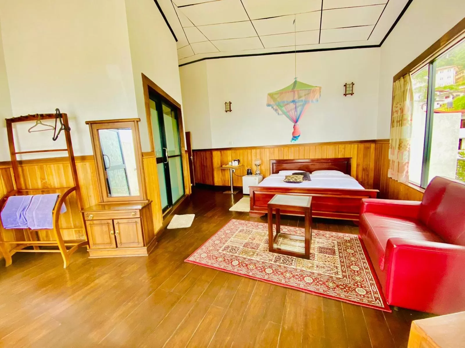 Bed in Srilak View Holiday Inn