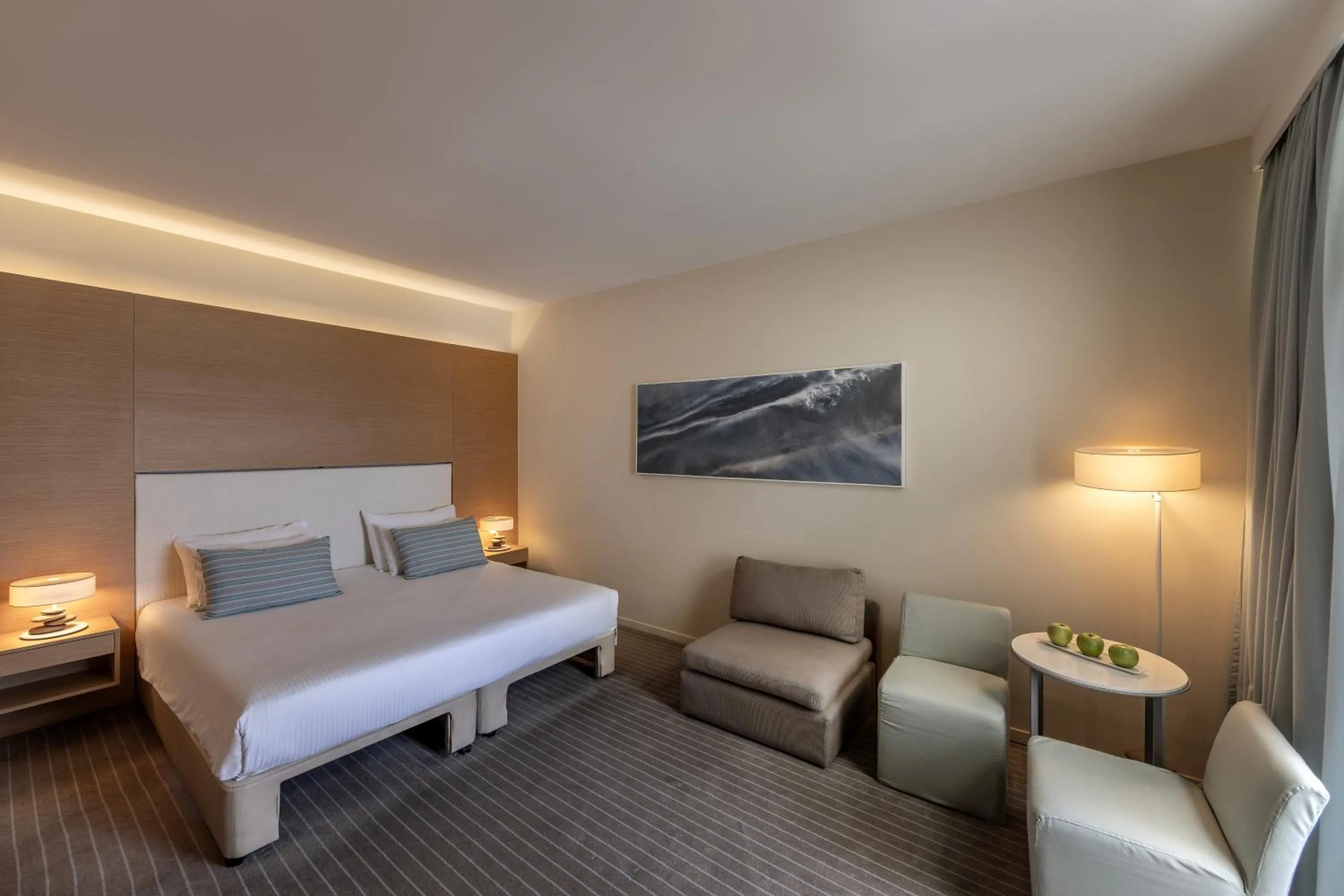 Bed in Capo Bay Hotel