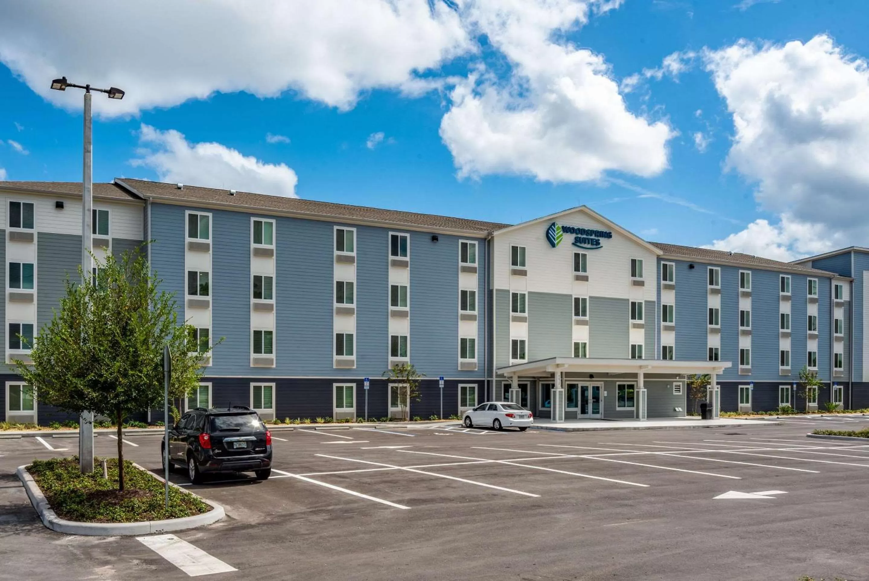 Property building in WoodSpring Suites Sanford North I-4 Orlando Area