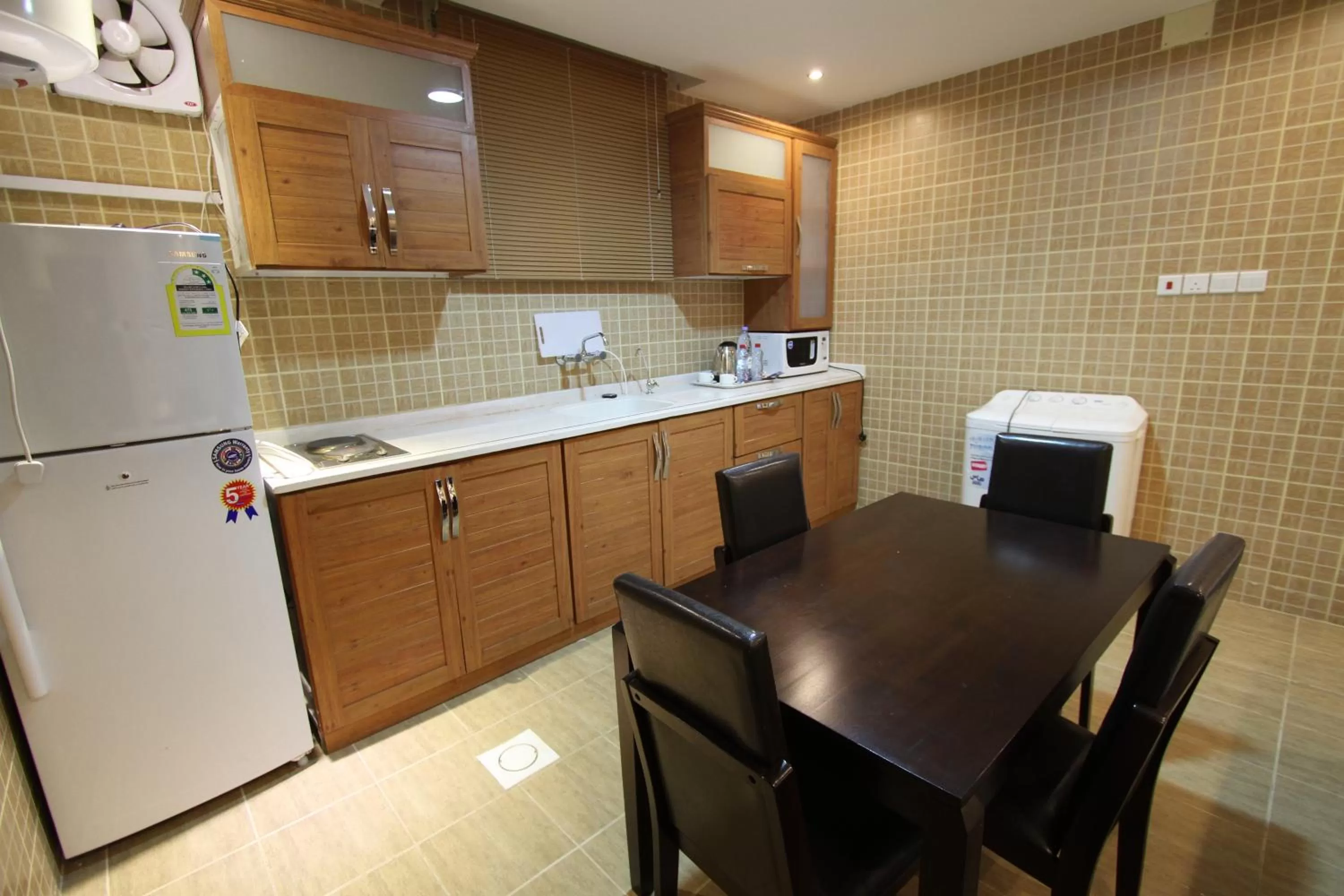 Dining area, Kitchen/Kitchenette in Manazel Al Hamra Apartment 2