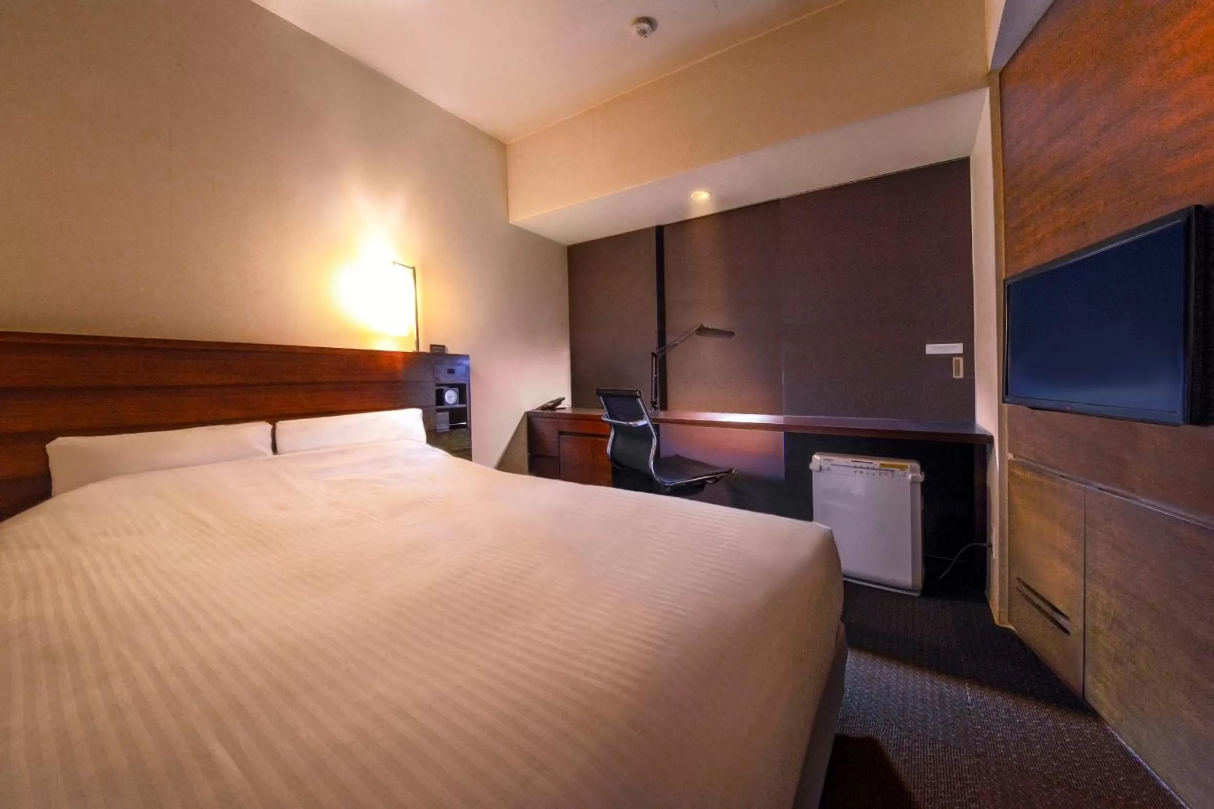 Photo of the whole room, Bed in JR Inn Sapporo