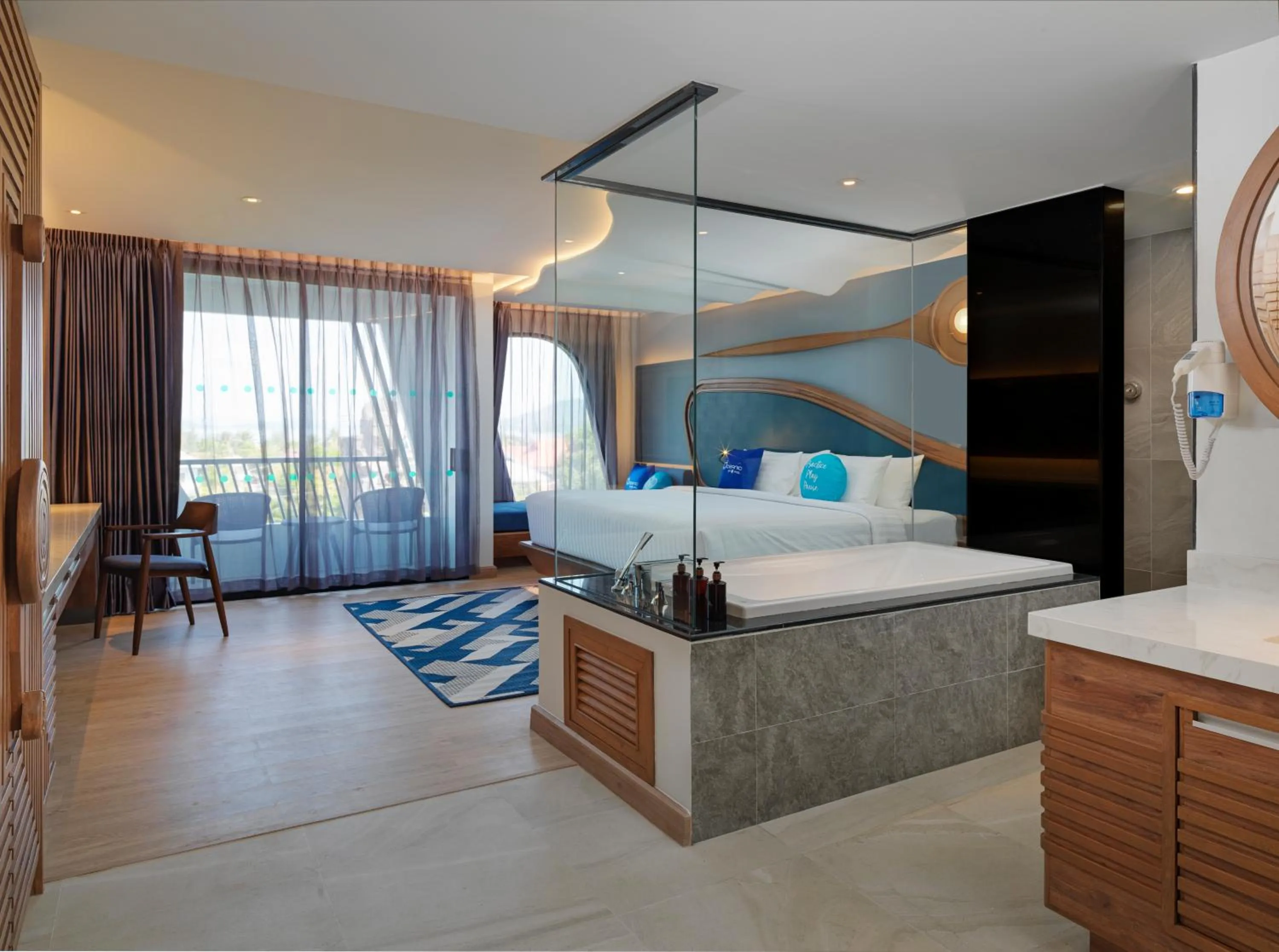 Photo of the whole room, Bed in The Oceanic Sportel Phuket - SHA Extra Plus