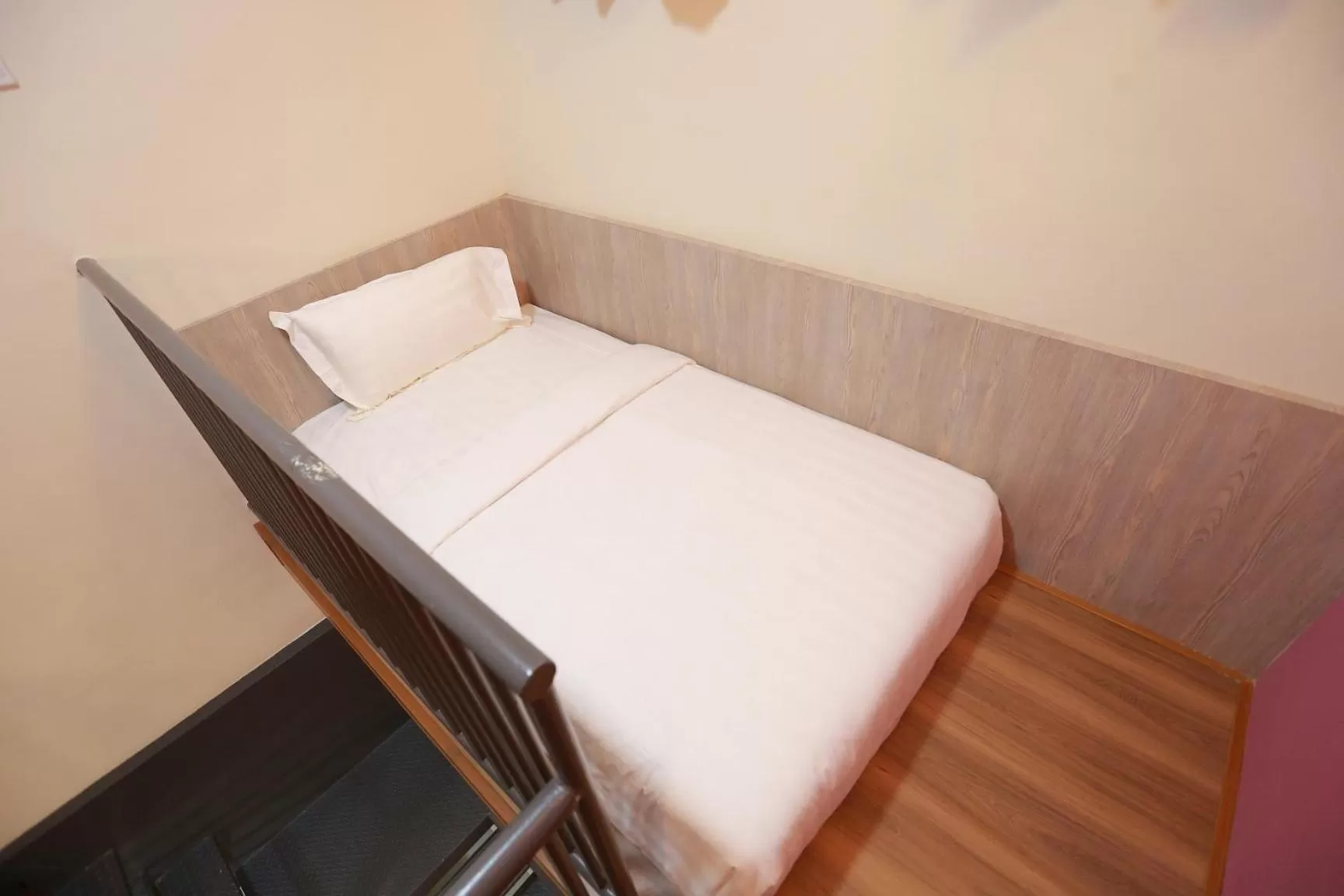 Bed in Pantai Regal Boutique Hotel