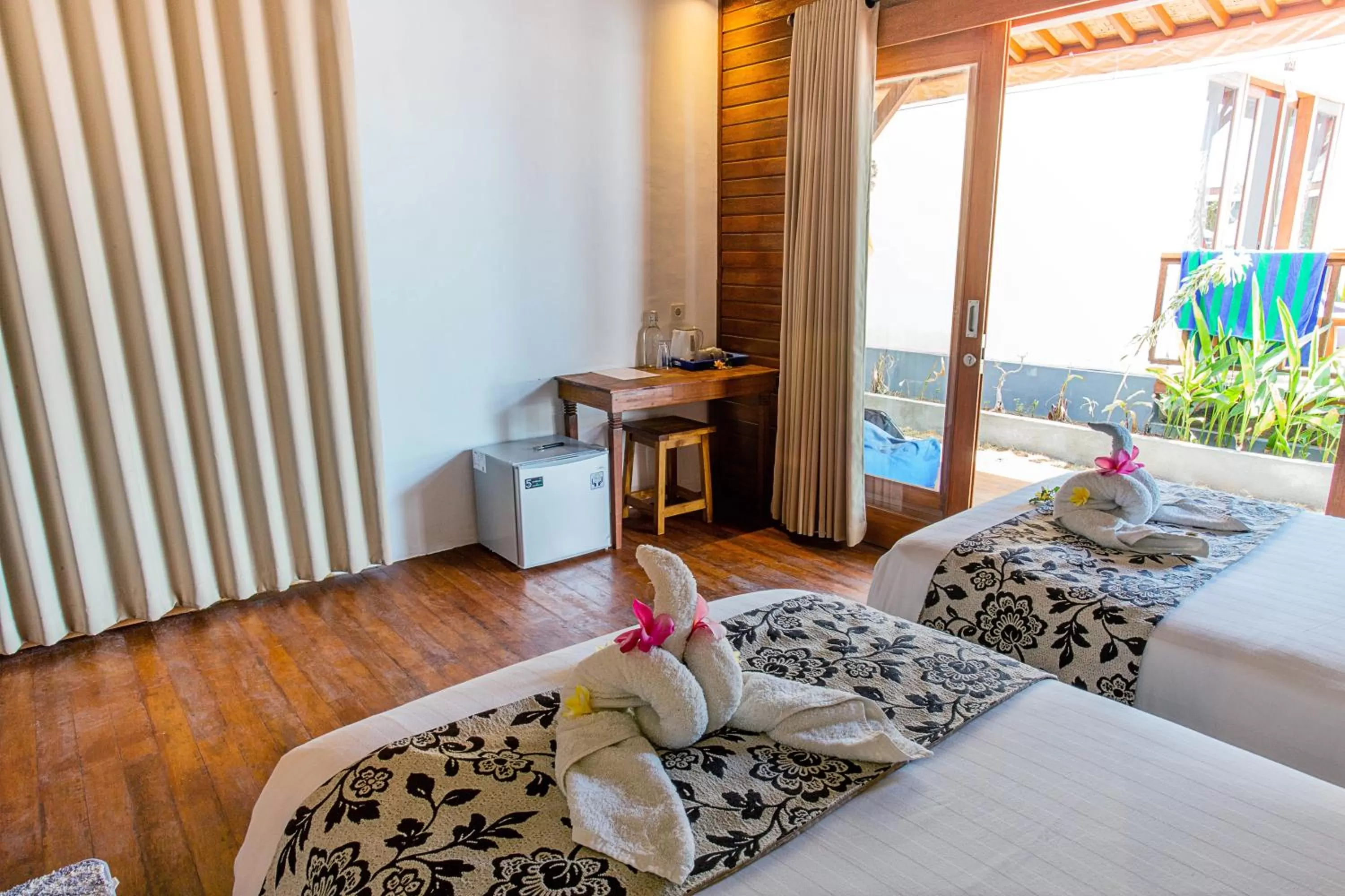 Bed in Nusa Veranda Sunset Villas & Restaurant