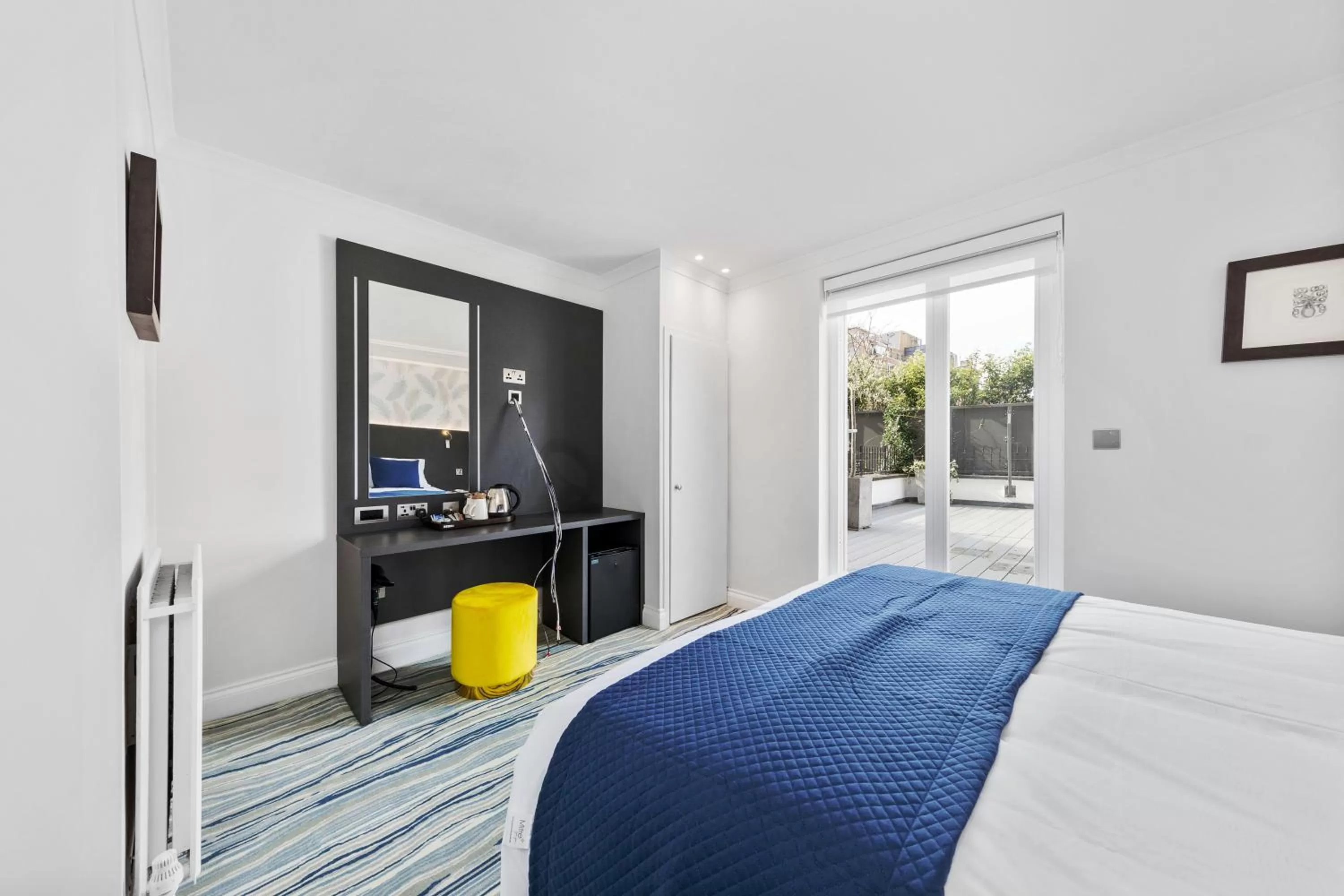 Bed in Commodore Hotel