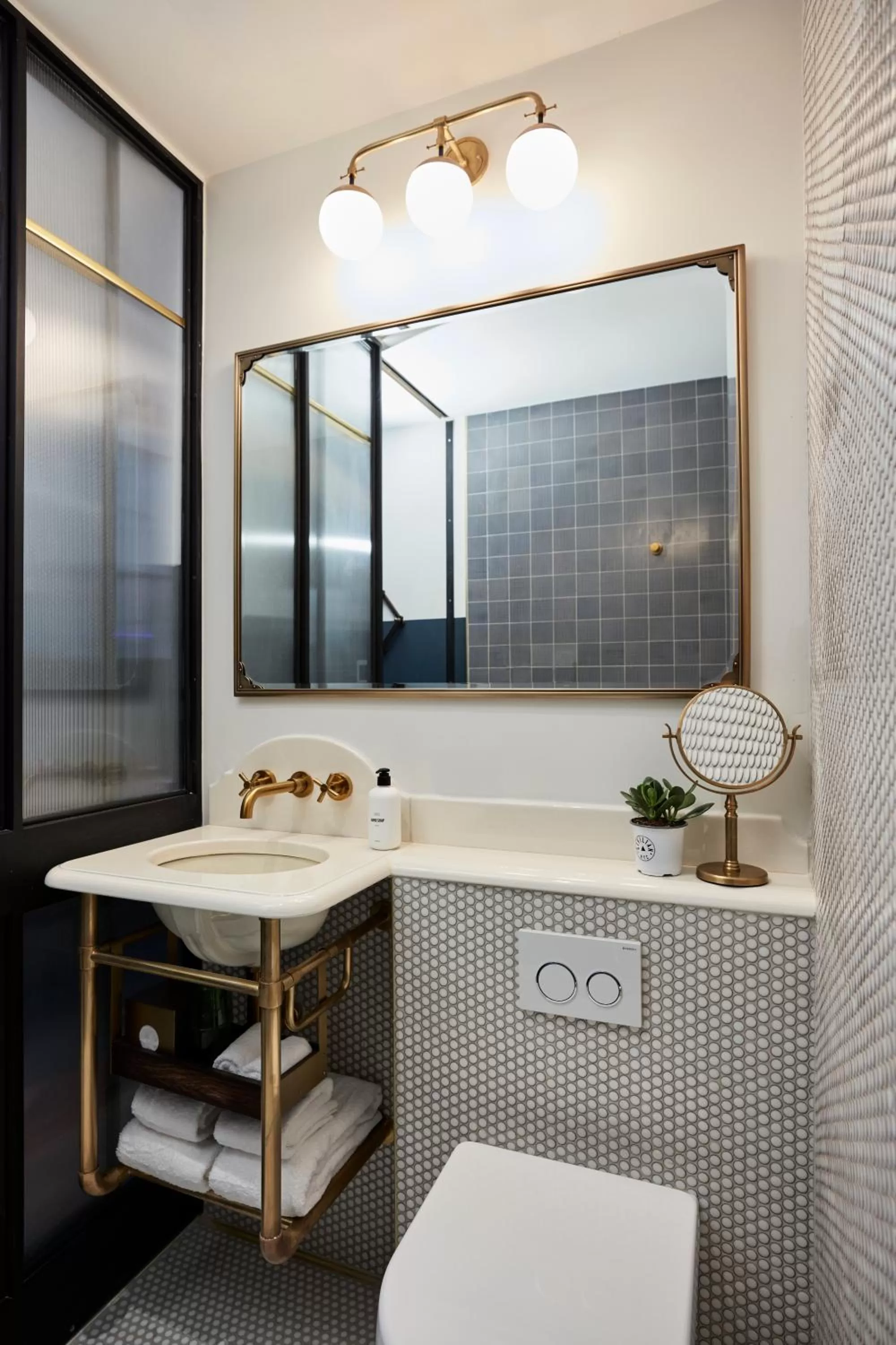 Bathroom in CIVILIAN Hotel