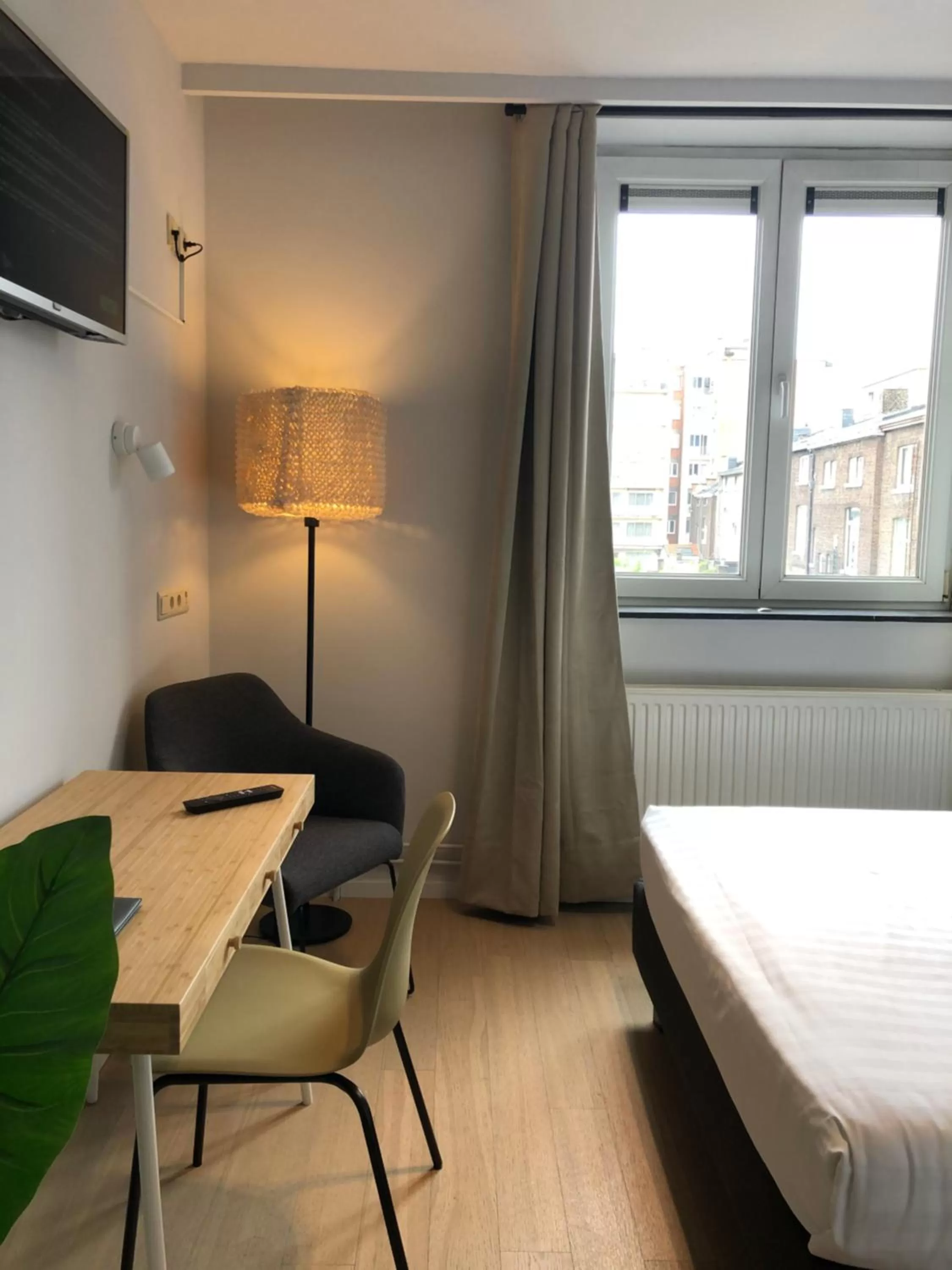 Bed in Hotel Le Cygne d'Argent