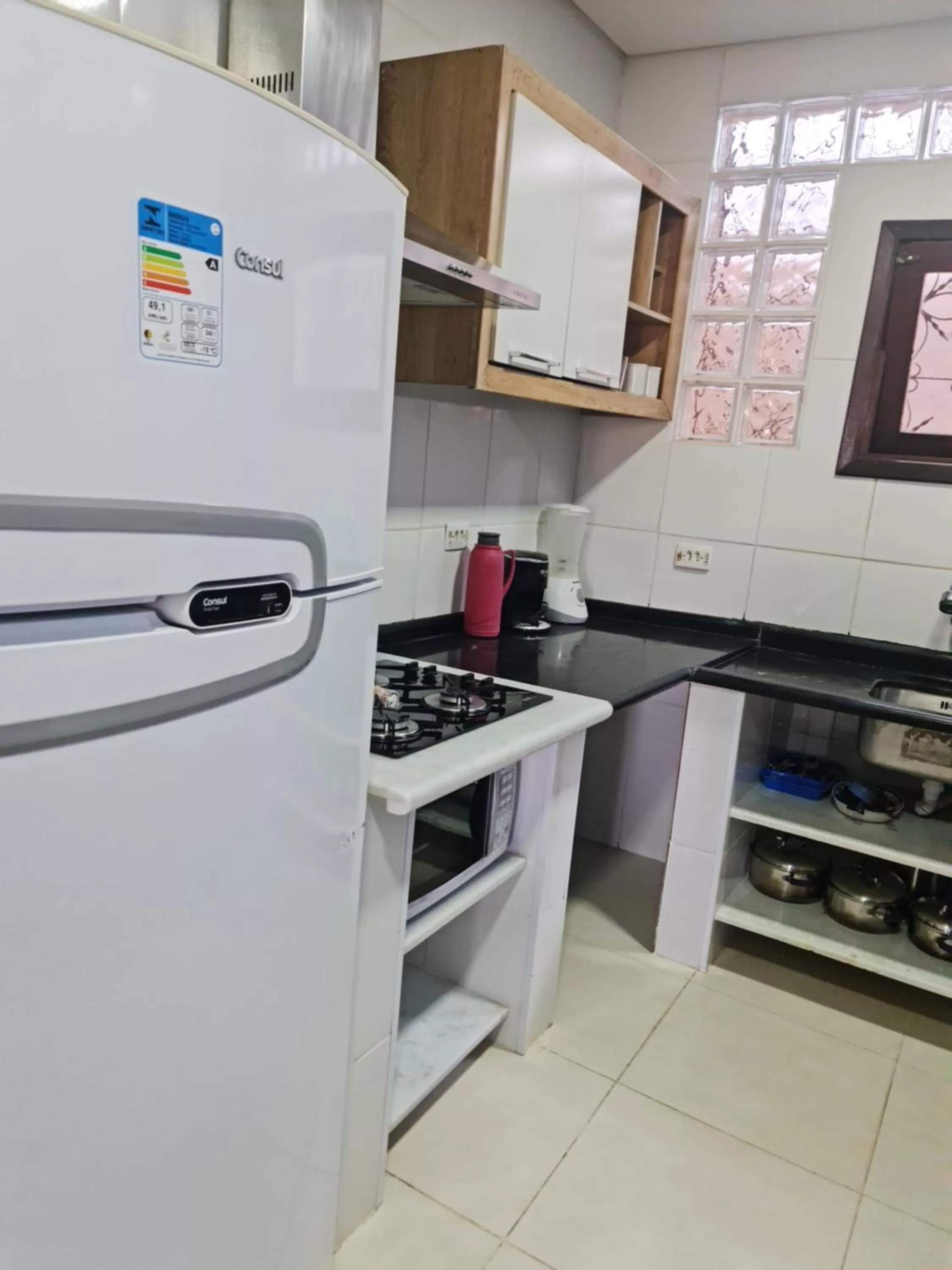 Kitchen or kitchenette in Apartamentos Casa da Pedra