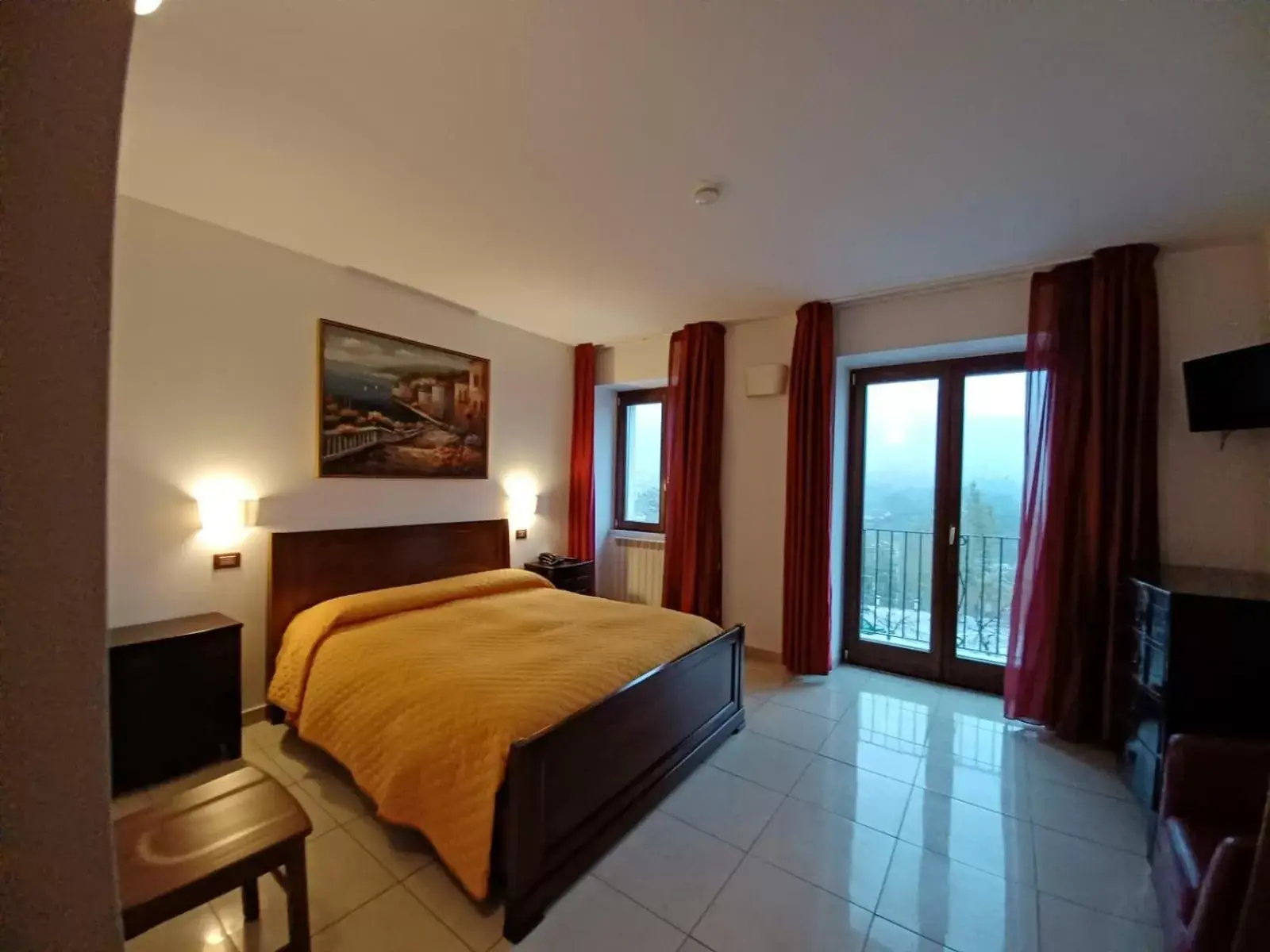 Quadruple Room in La Corte di Bacco Hotel & Ristorante Quadruple Room in La Corte di Bacco Hotel & Ristorante
