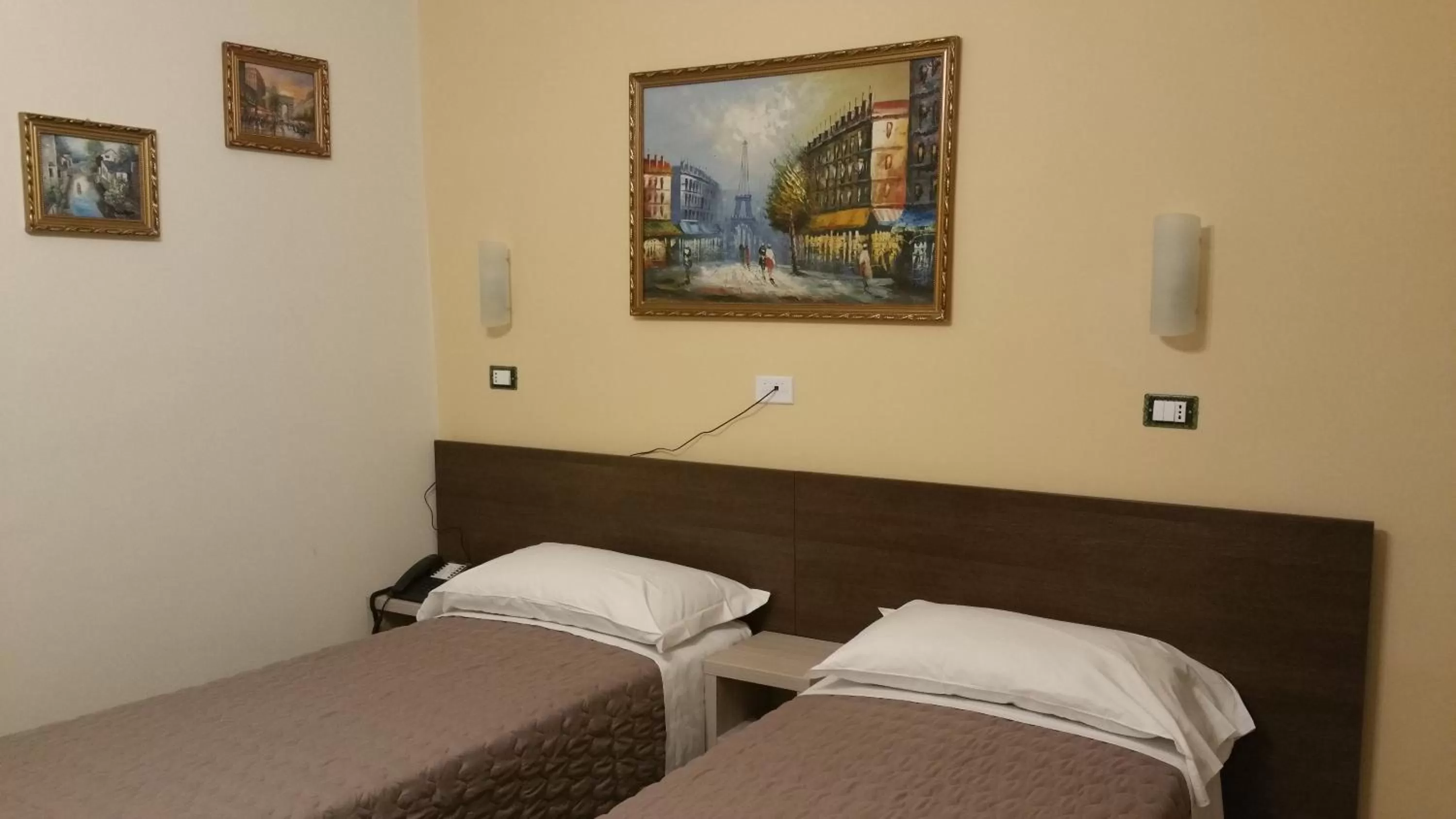 Bed in Hotel Tommaseo