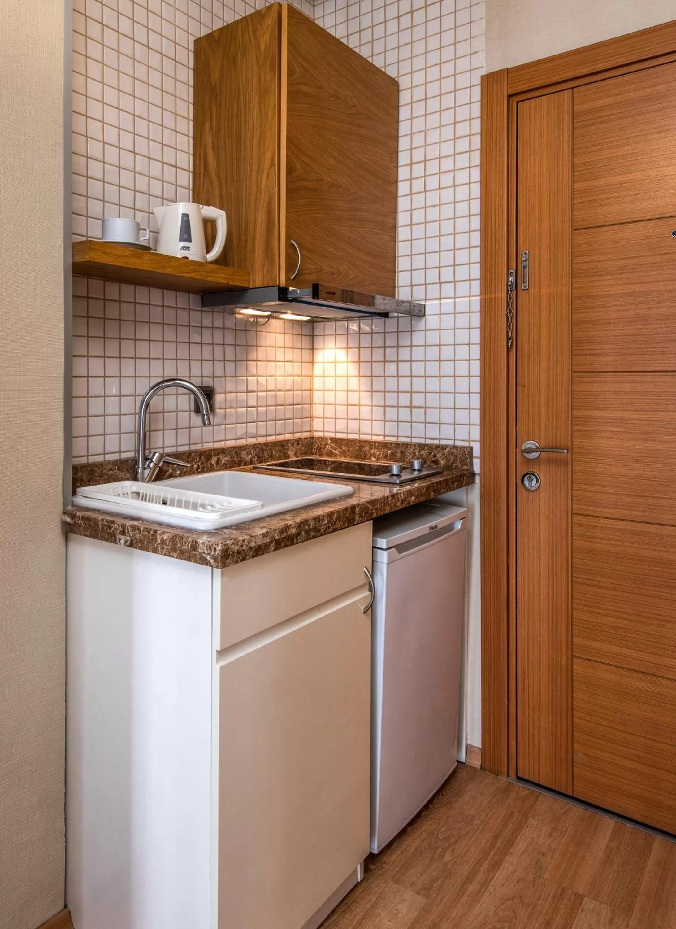 Kitchen or kitchenette in Mezzo Hotel