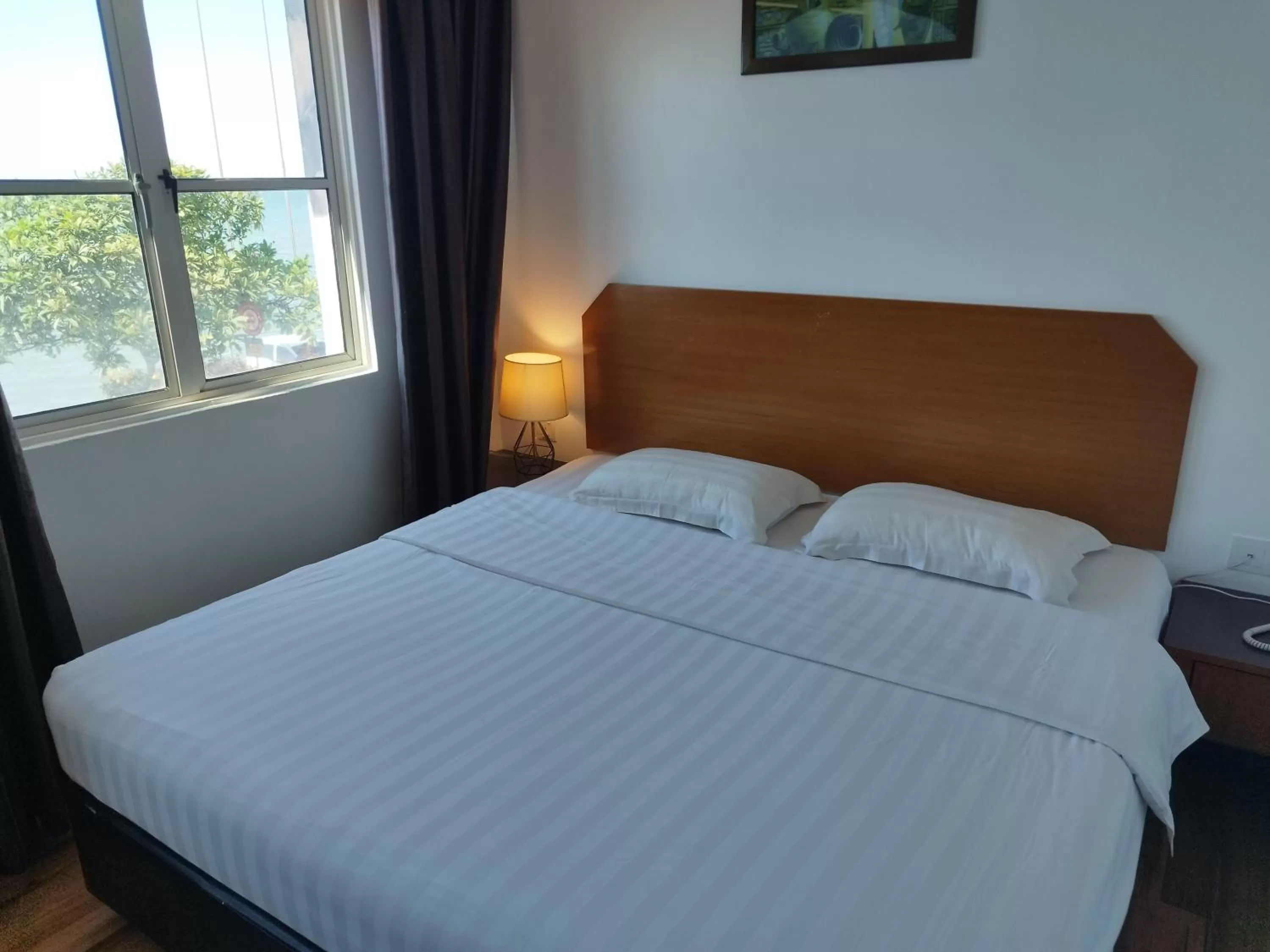 Bed in Marine Bay Hotel