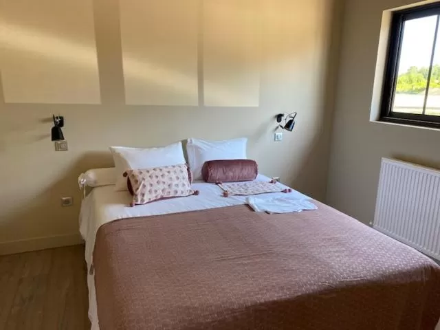 Bed in Écolodges du Golf du Sauternais