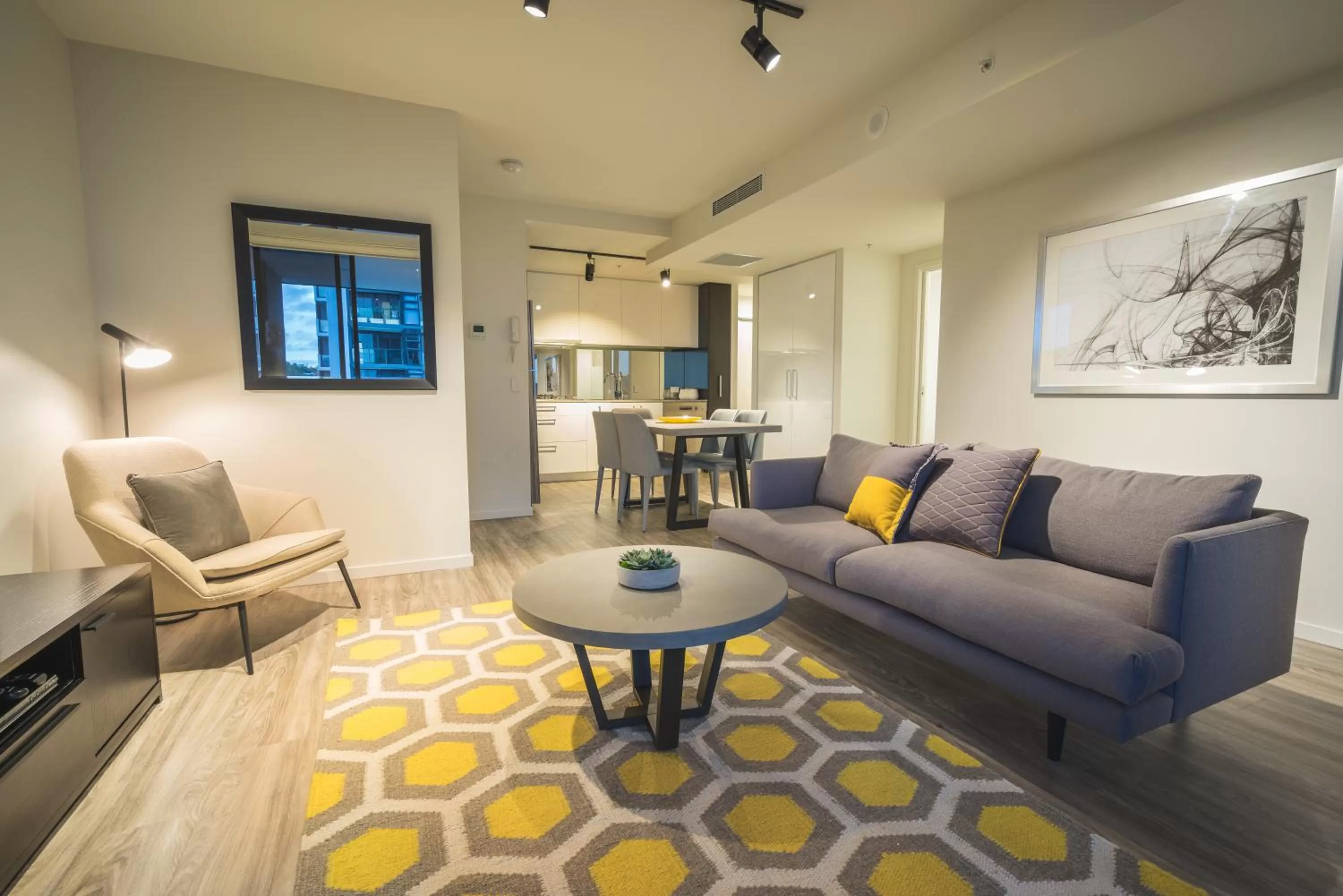 Living room in Arena Apartments by CLLIX