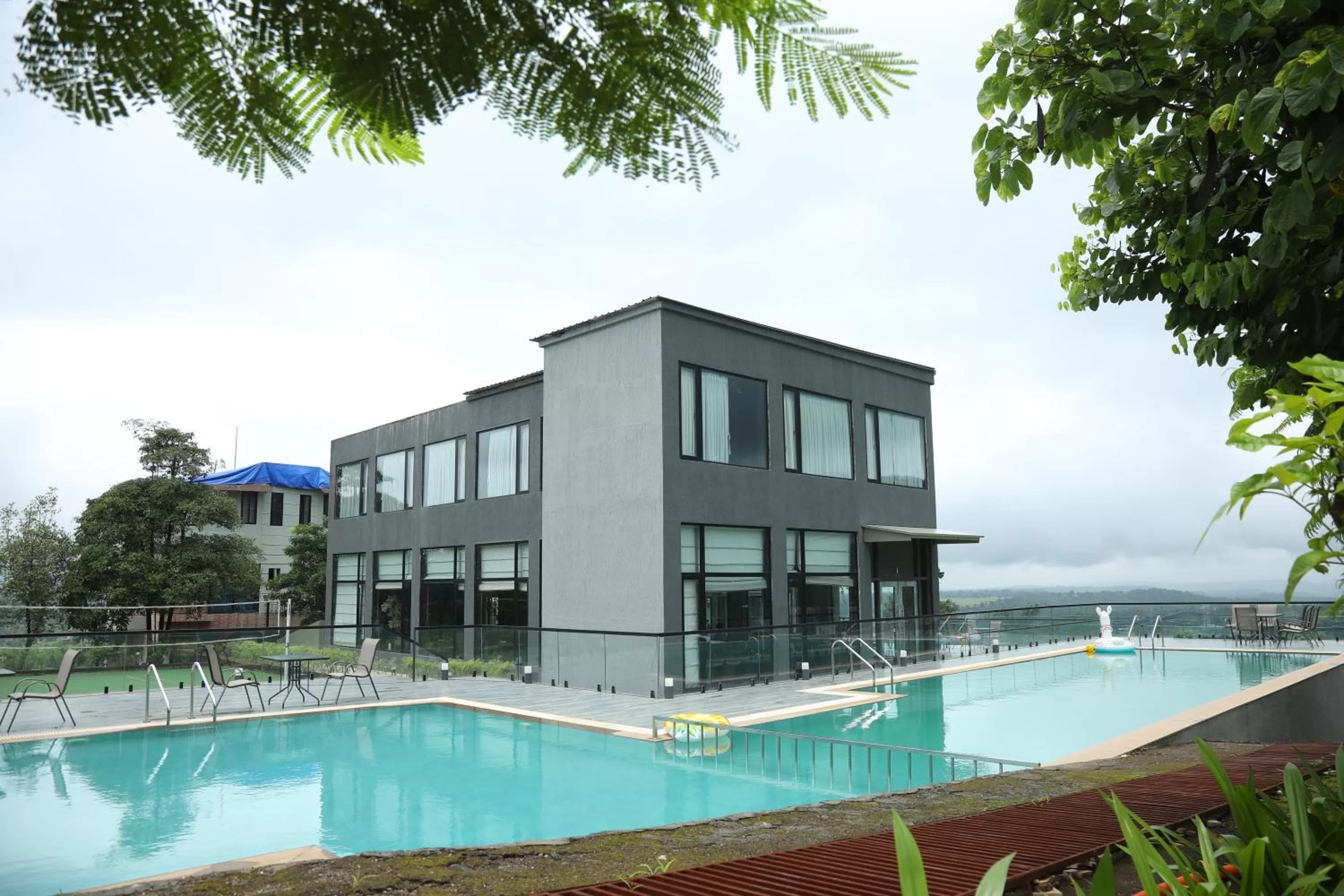 Property building, Swimming Pool in Paraiso Resort & Club