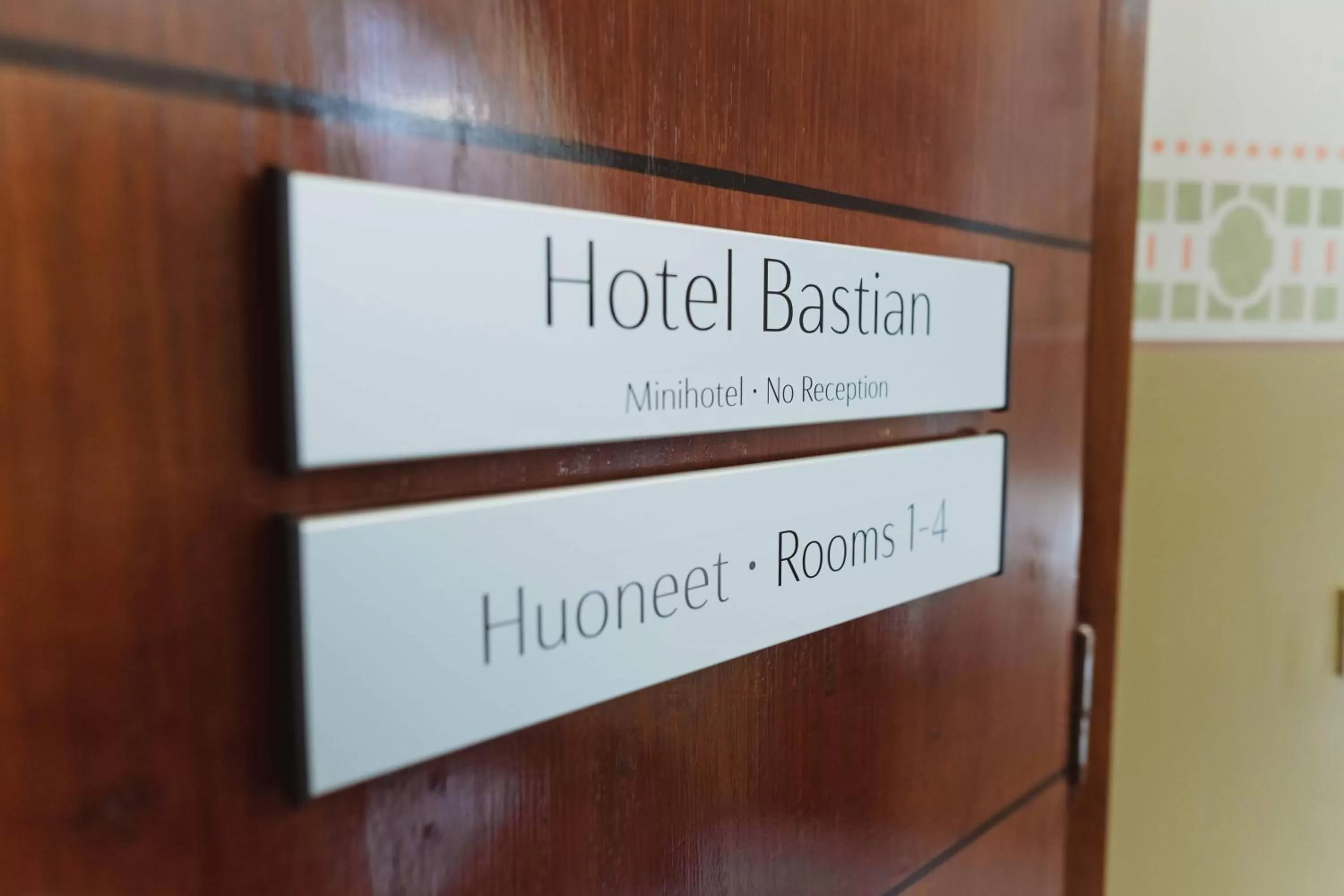 Property logo or sign in Hotel Bastian