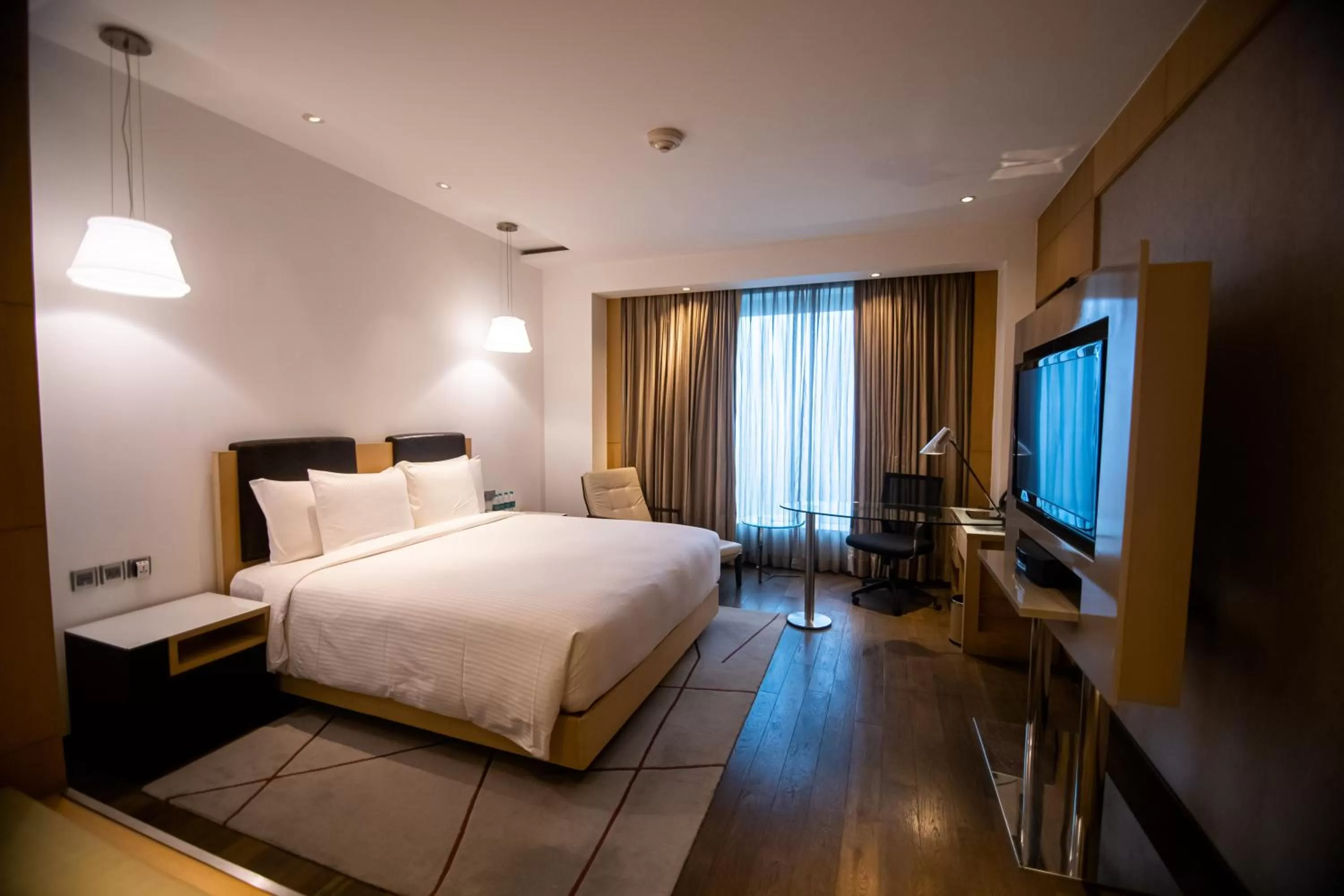 Bedroom, Bed in Crowne Plaza Greater Noida by IHG