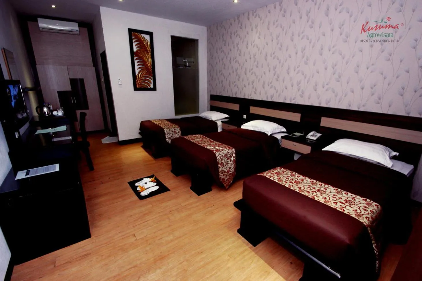 Bed in Kusuma Agrowisata Resort & Convention
