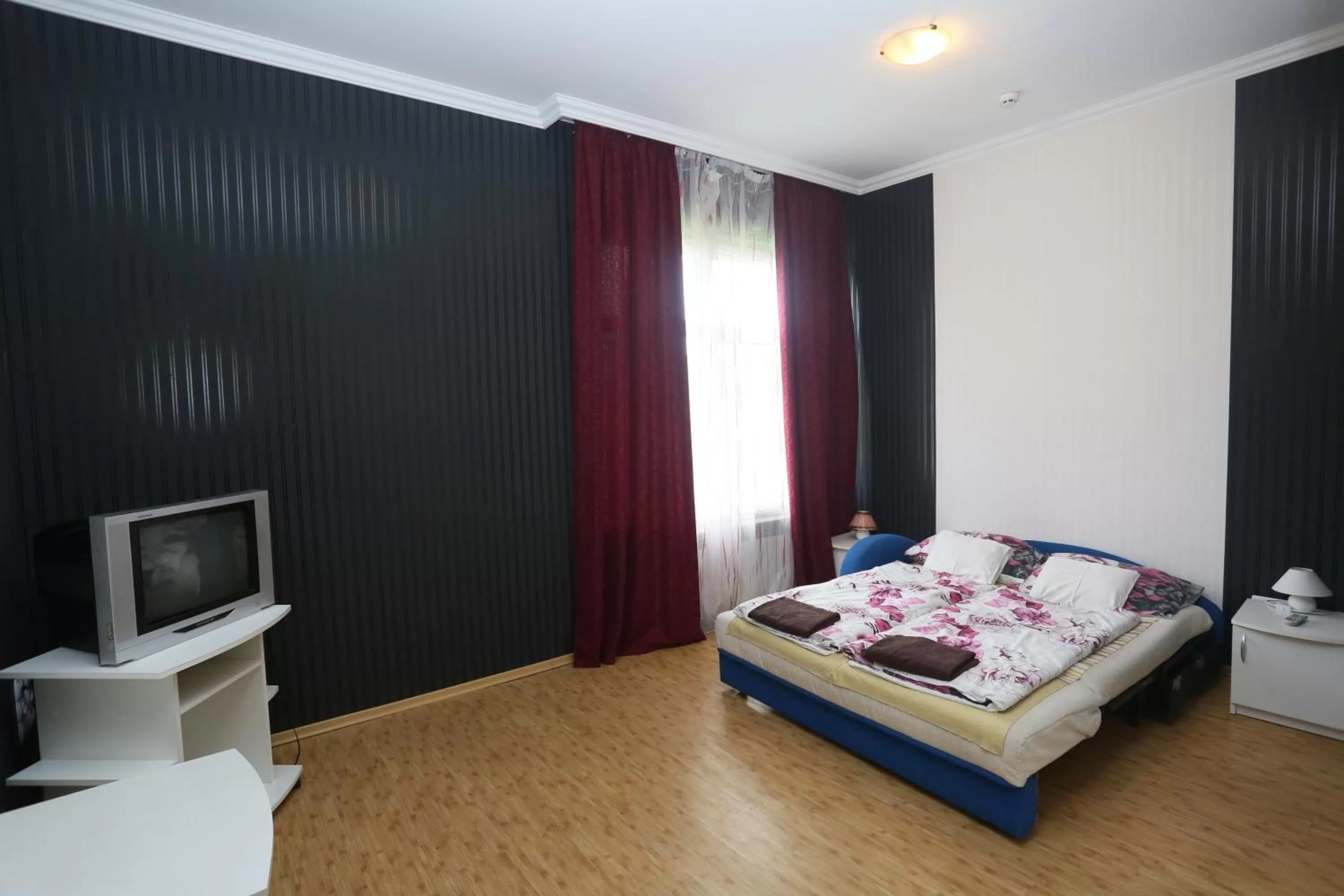 Photo of the whole room, Bed in Praktik Hotel & Restaurant