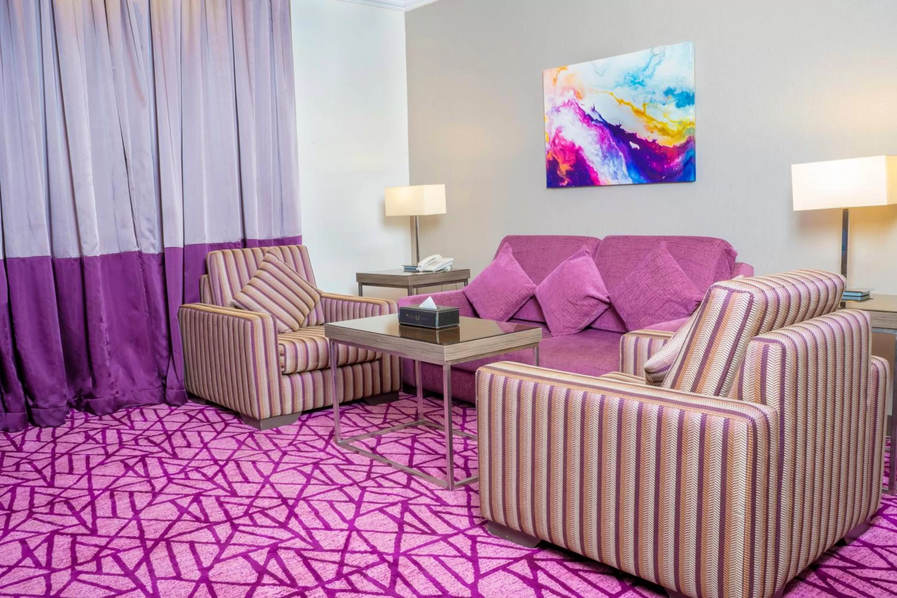 Living room in Aquila Al Hamra Hotel