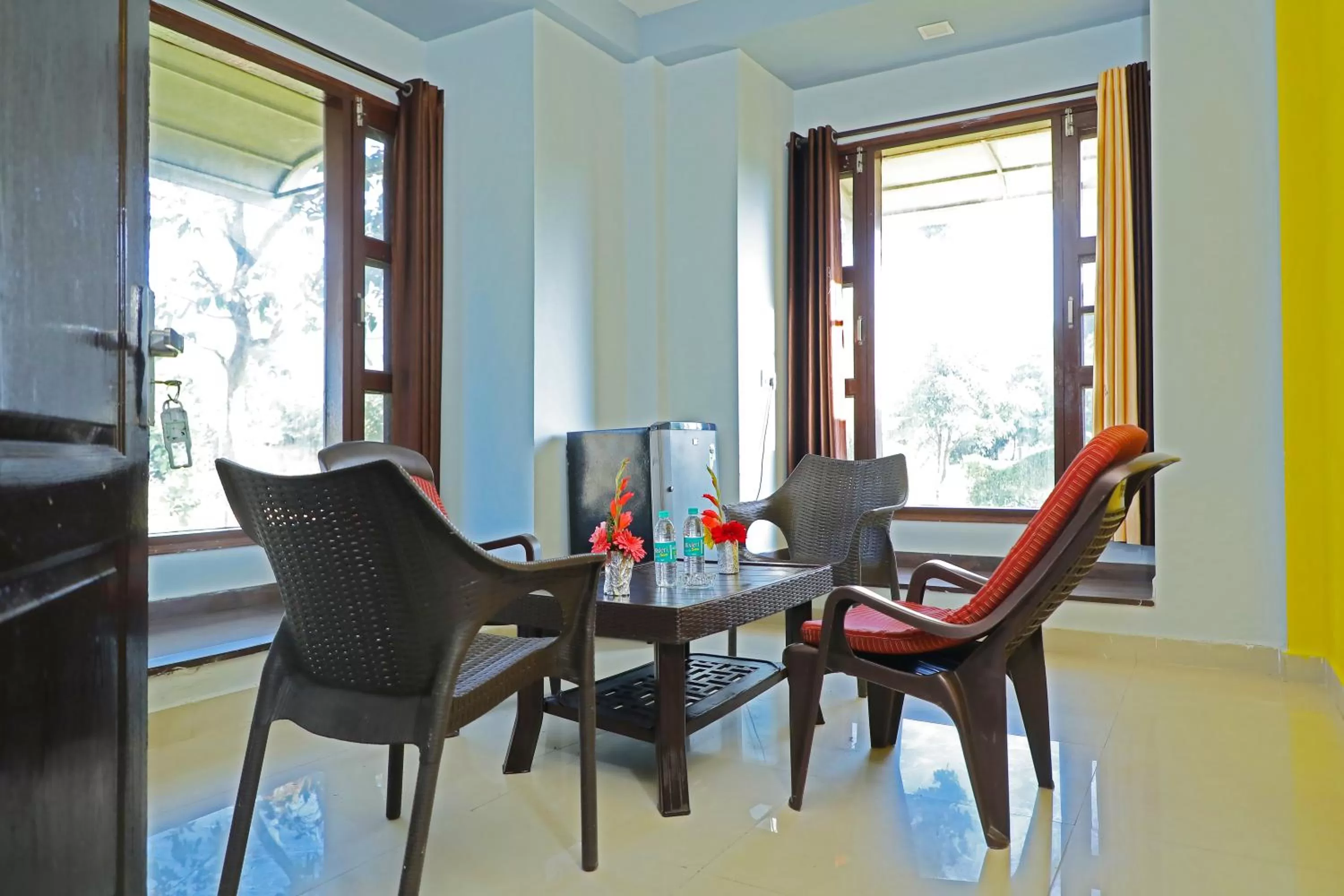 Seating area in Corbett Treat Resort By Atya Hotels