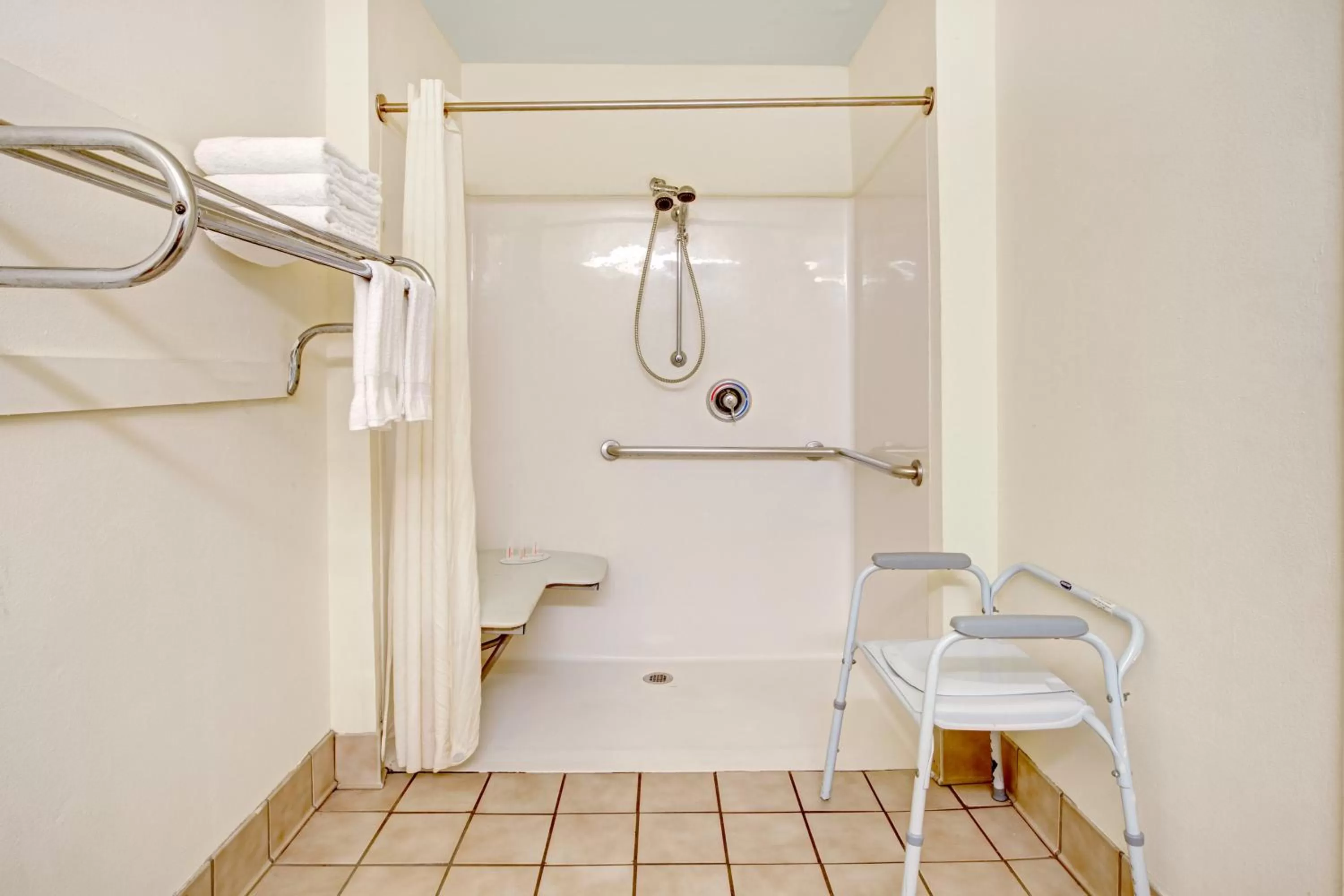 Shower in Super 8 by Wyndham Arlington Near AT&T Stadium