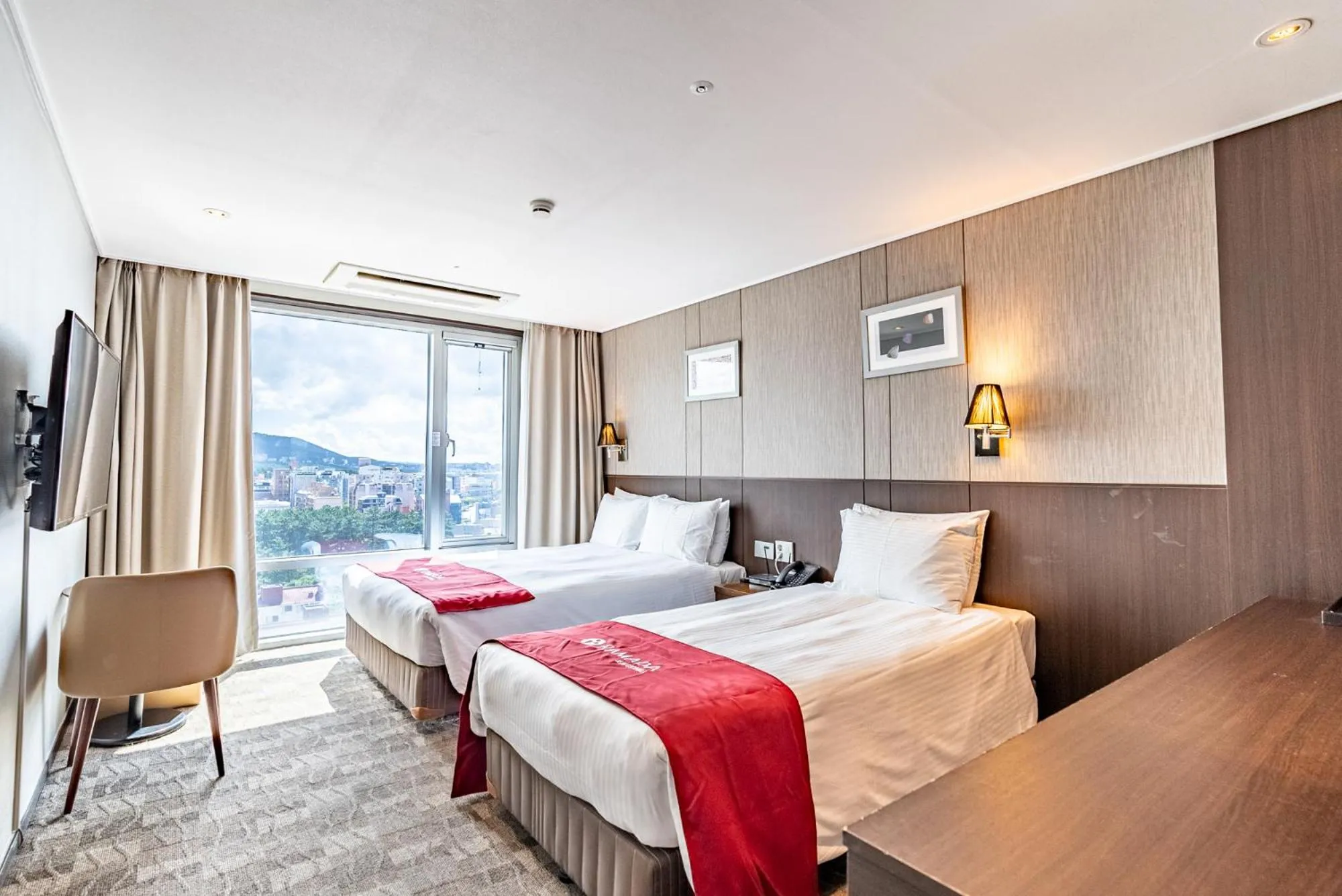 Bed in Ramada by Wyndham Jeju City Hall