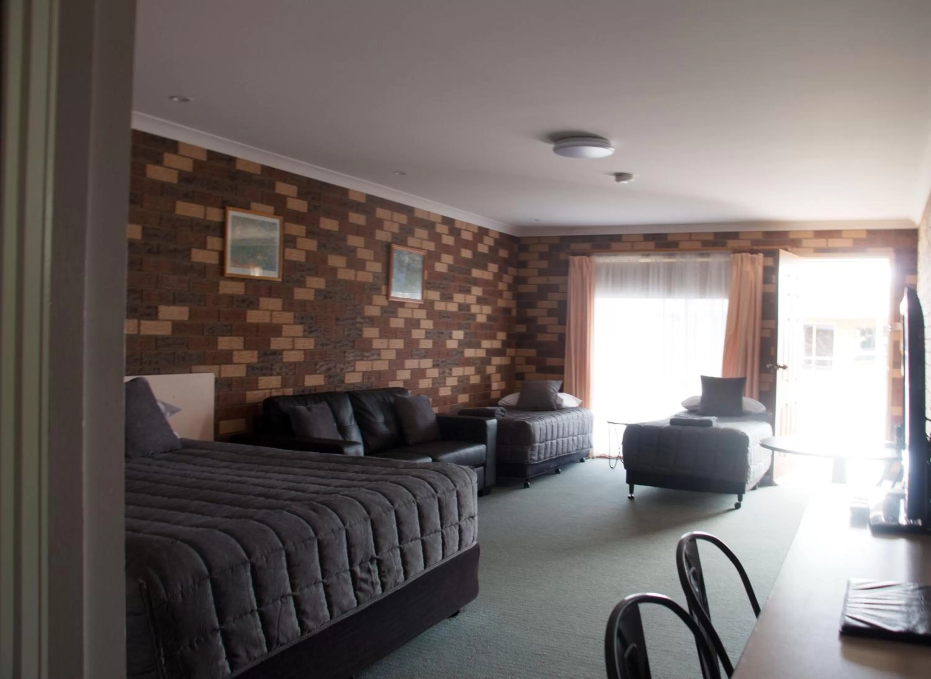 Photo of the whole room in Highway Inn Motel