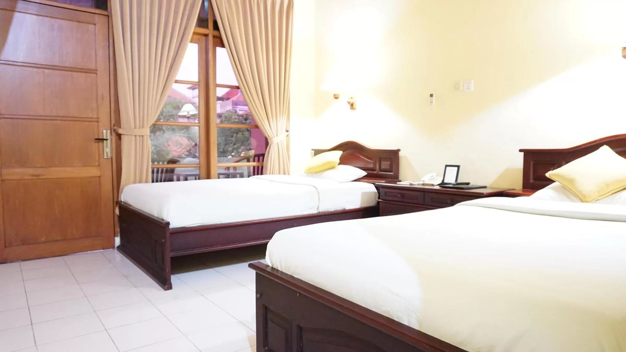 Bed in Masainn Hotel Kuta