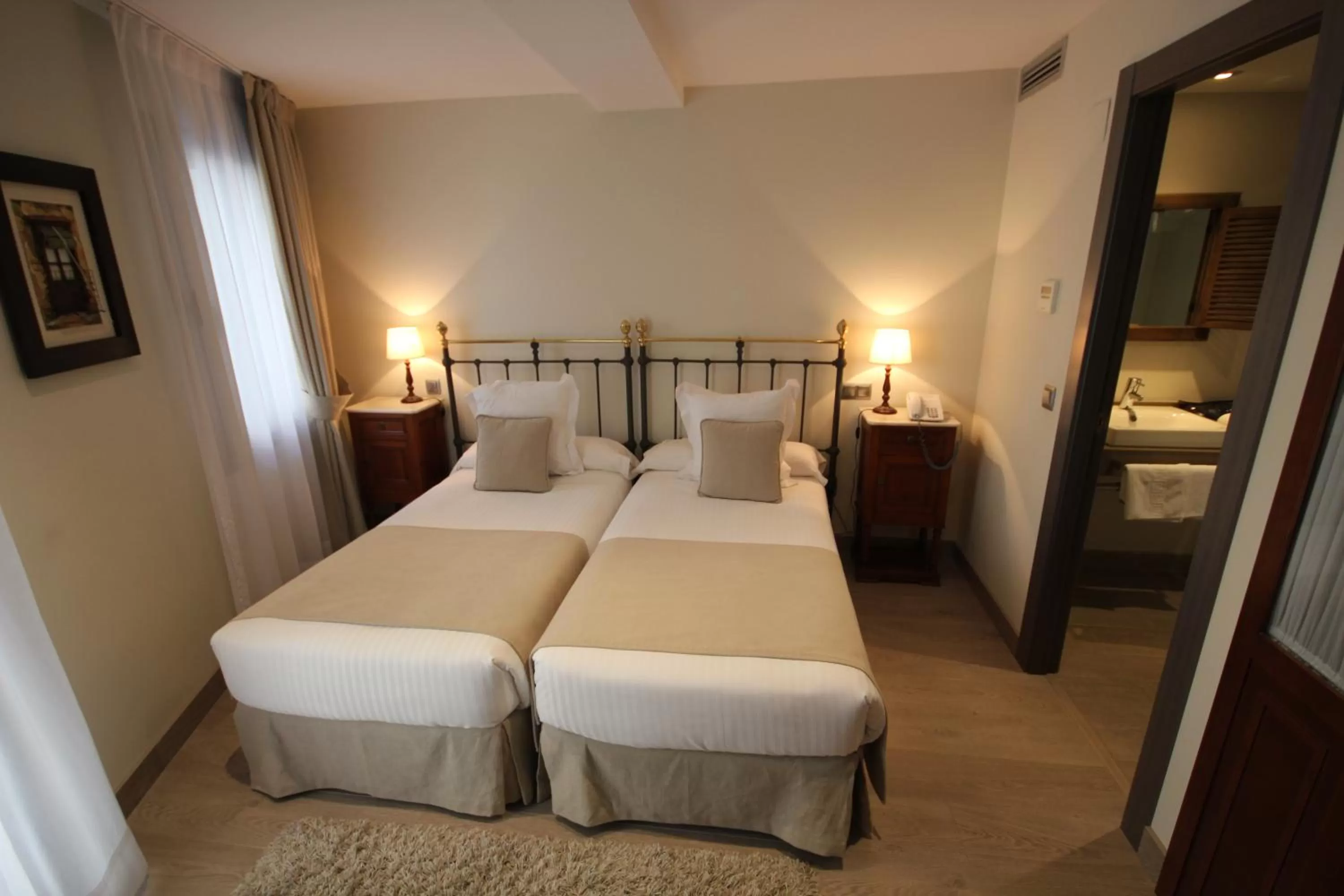 Bed in Le Petit Boutique Hotel