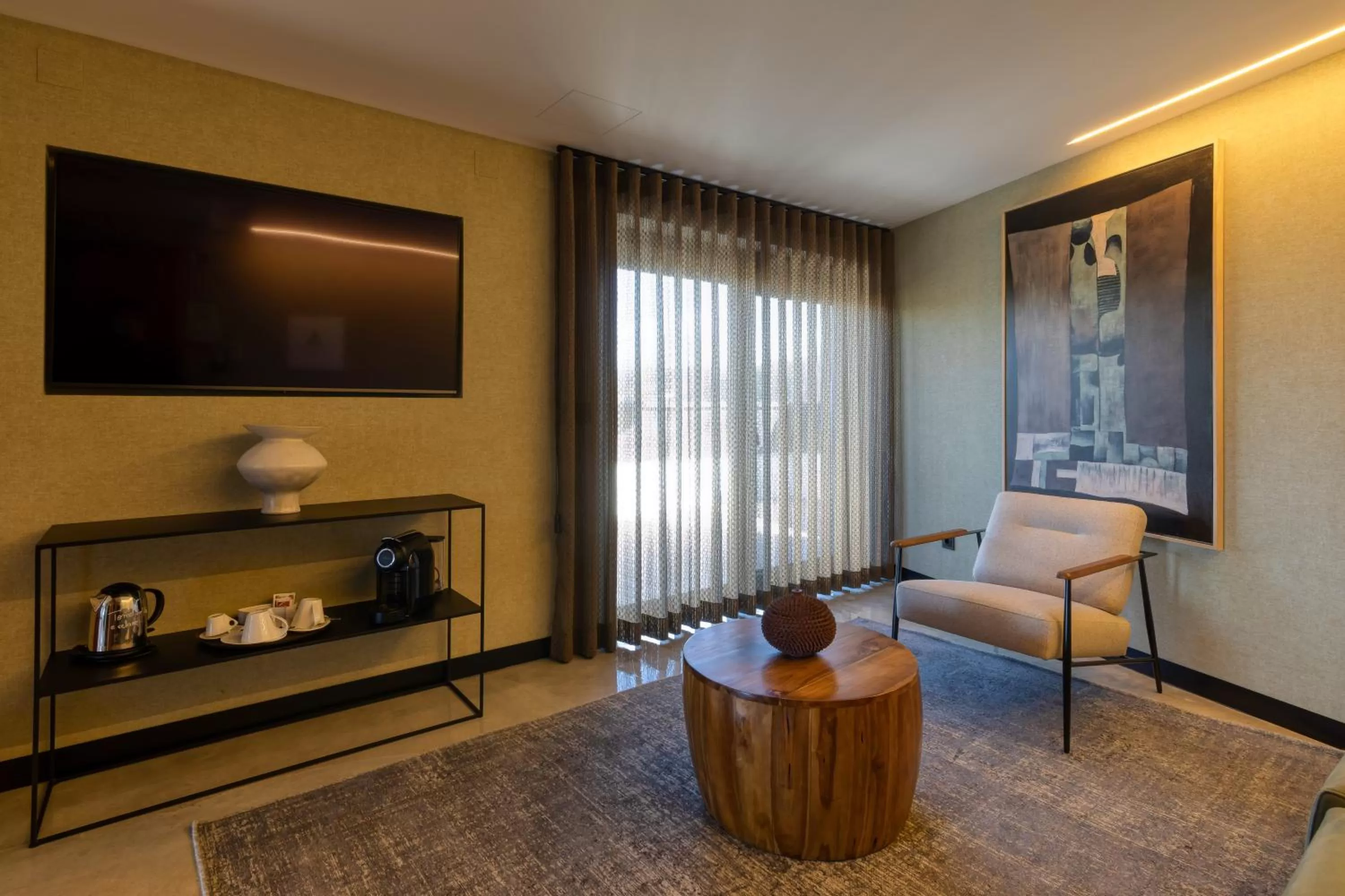 Communal lounge/ TV room in Well Hotel & Spa