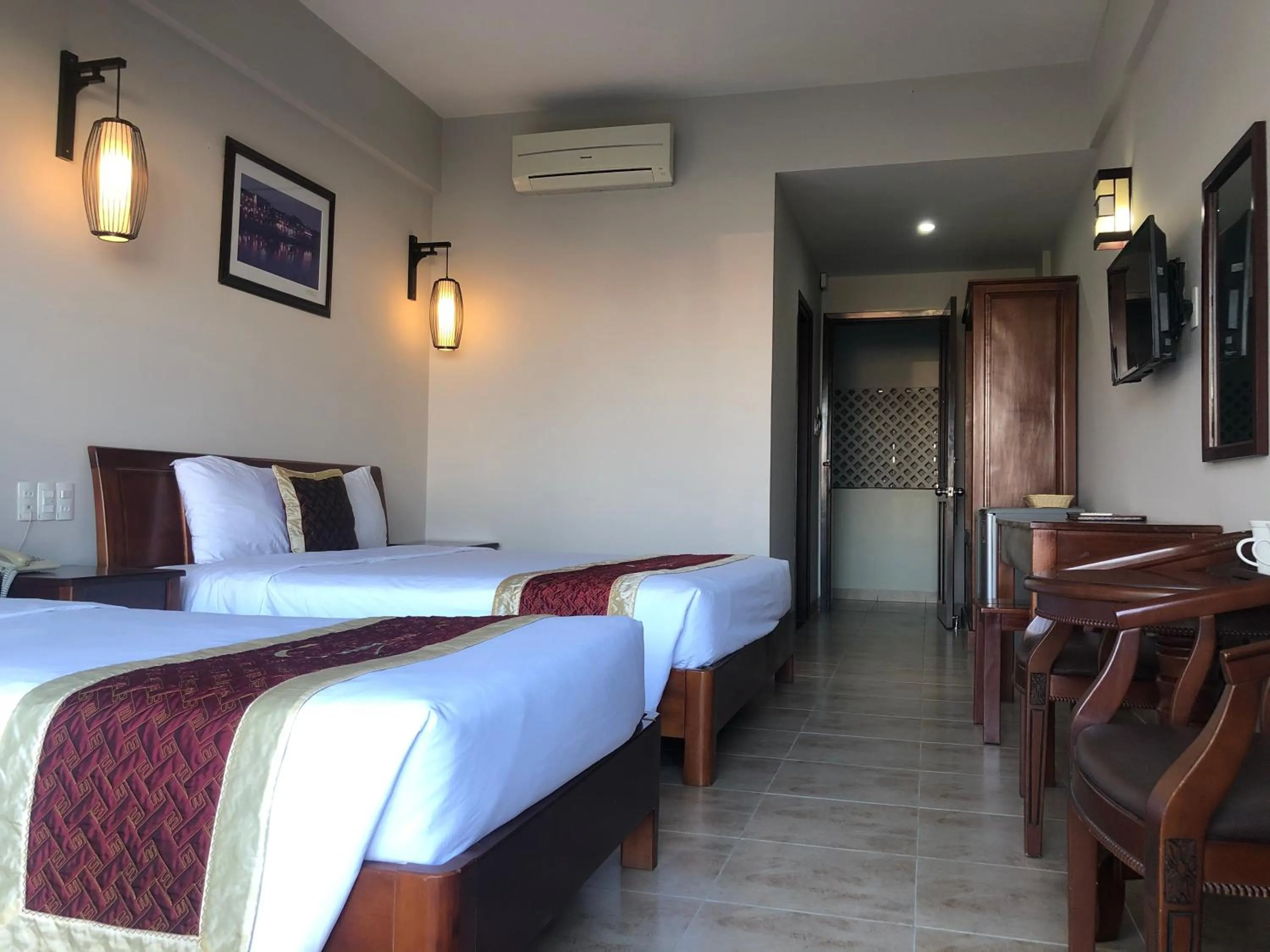 Bed in Sunshine Hoian Hotel