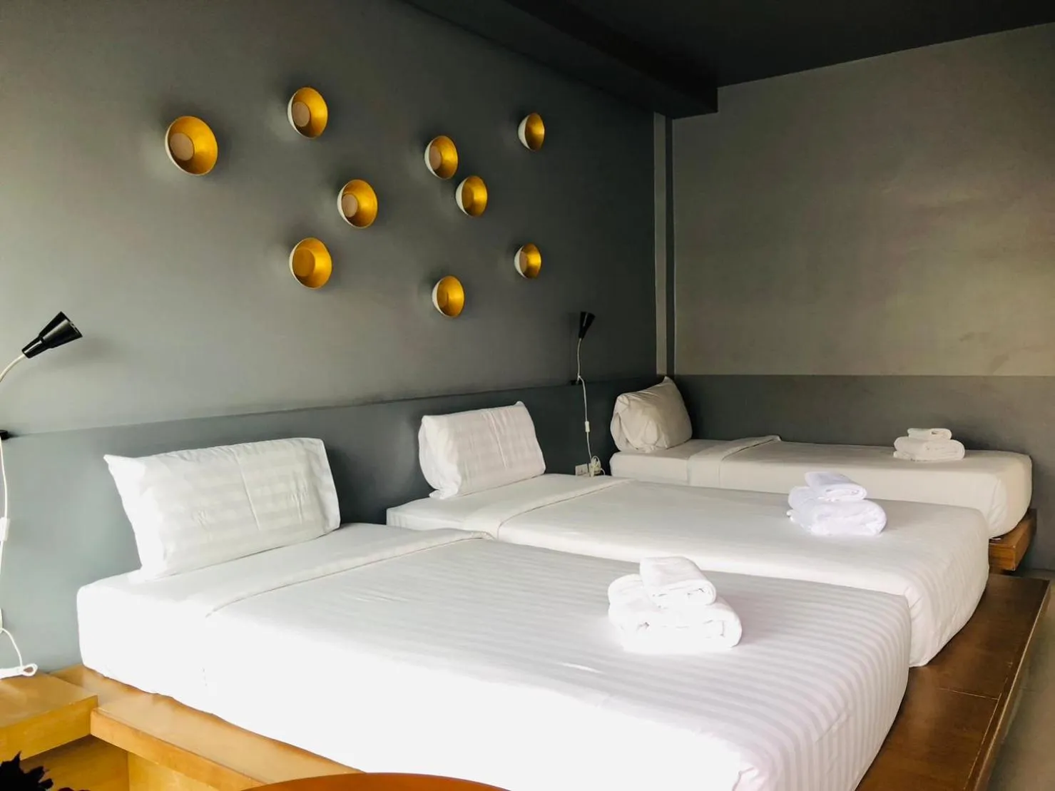 Bed in The Rubber Hotel Phuket