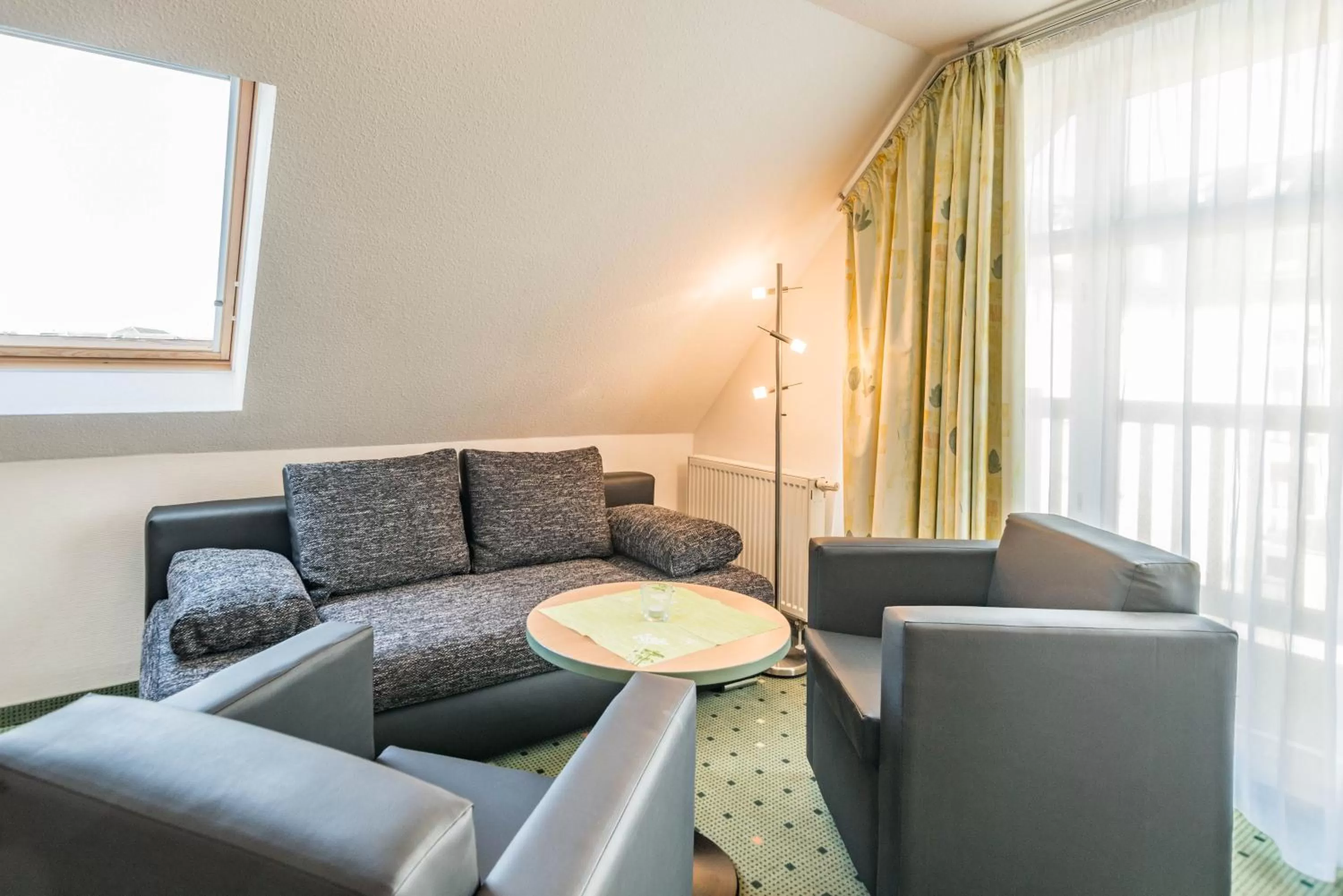 Photo of the whole room, Seating Area in Am Weststrand Apartmenthaus Waldeck