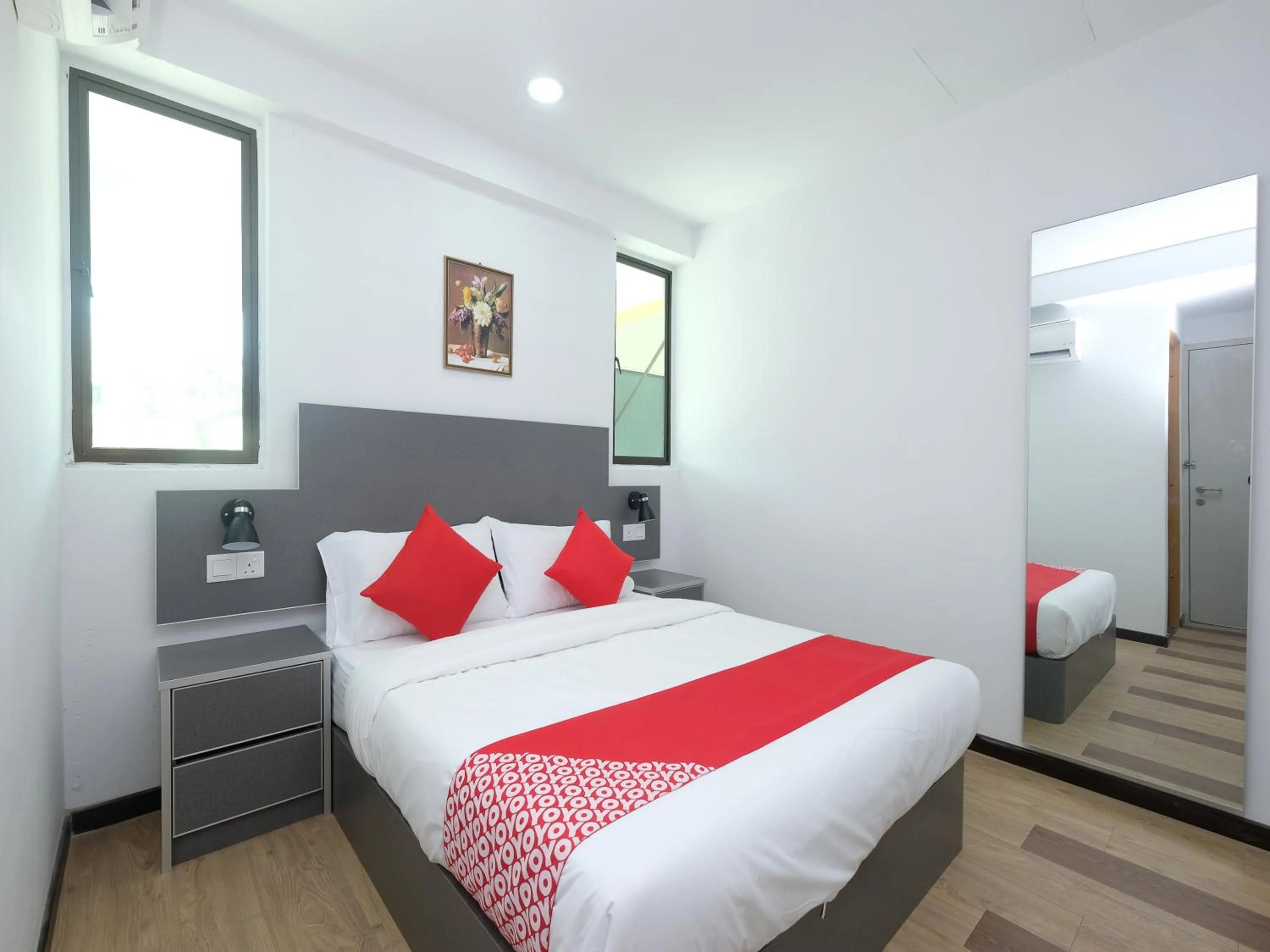 Bedroom, Bed in OYO 44043 First Garden Hotel