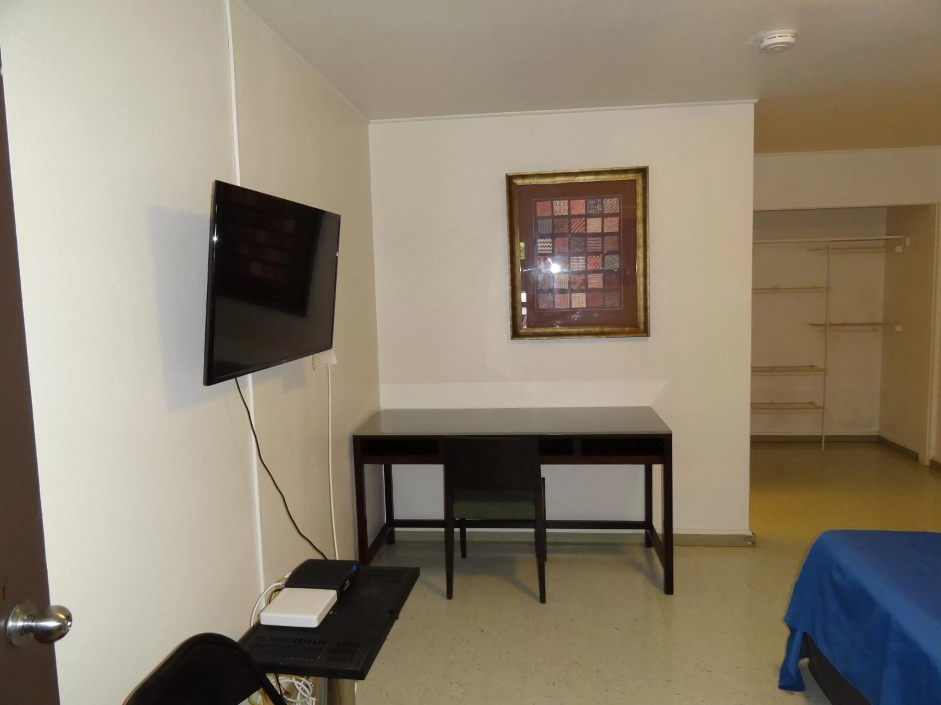 Bed in Tip Top Motel