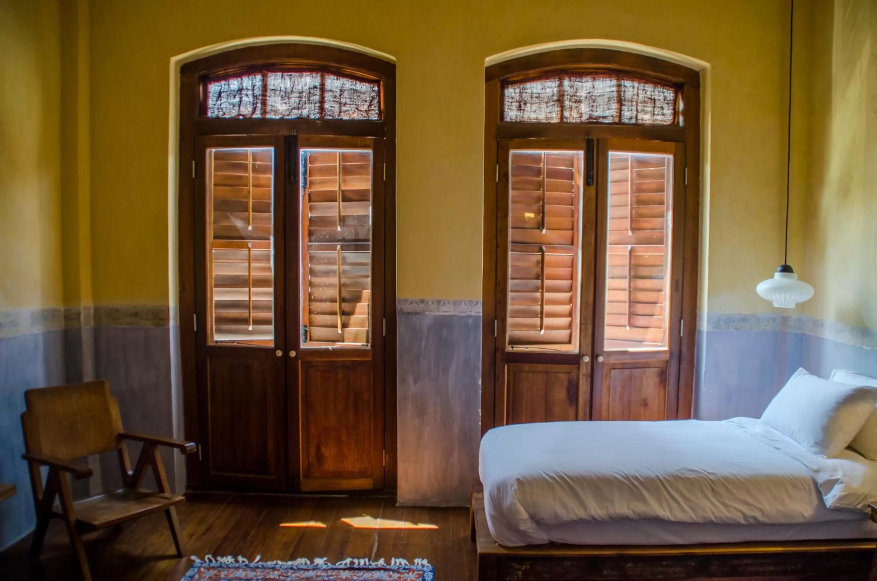 Bed in Ren I Tang Heritage Inn